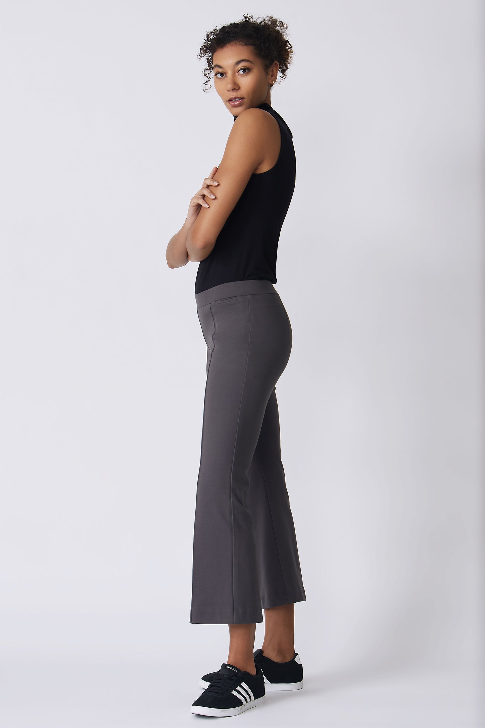 Kal Rieman Pintuck Crop Flare in charcoal ponte on model side view with arms crossed