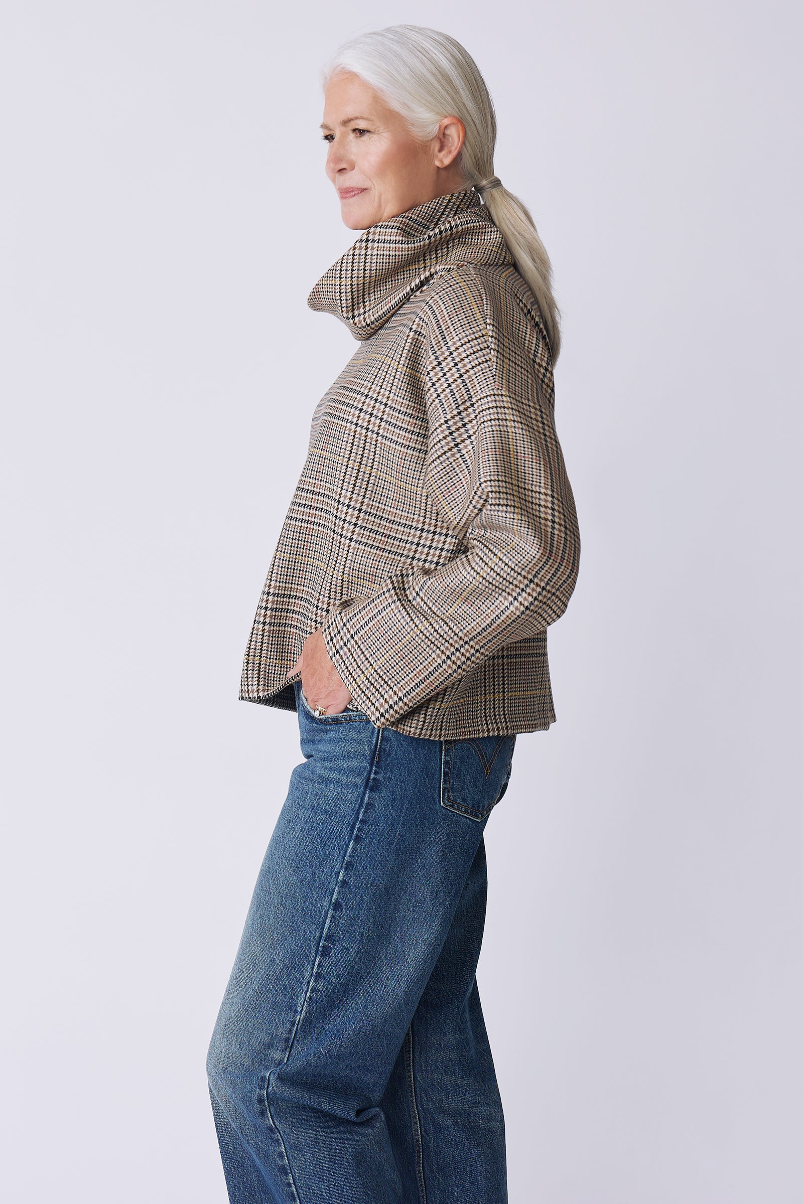 Kal Rieman Polina Bias Tneck Pullover in italian plaid on model side view hand in pocket