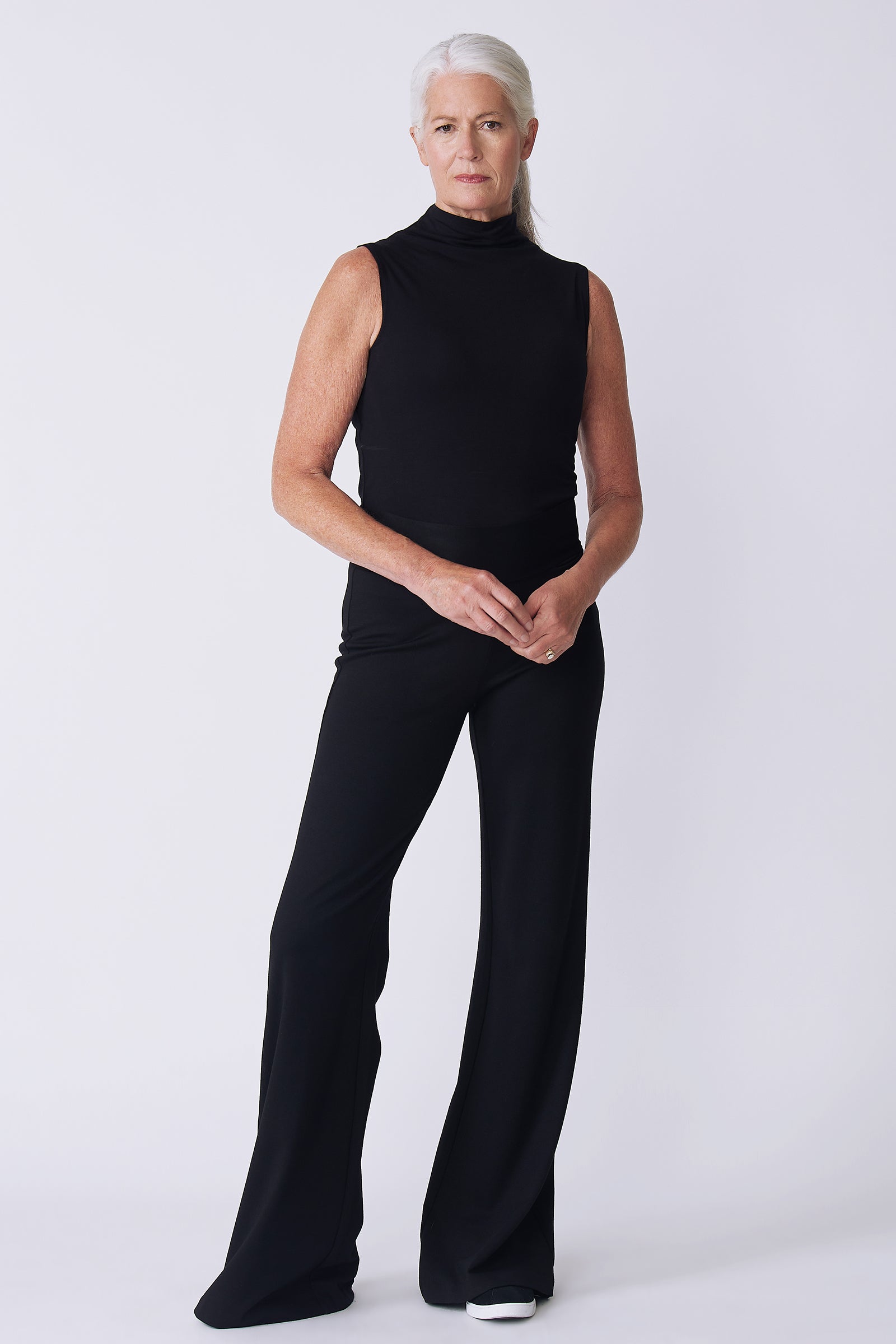 Kal Rieman Ponte Wide Leg in black on model front view holding hands