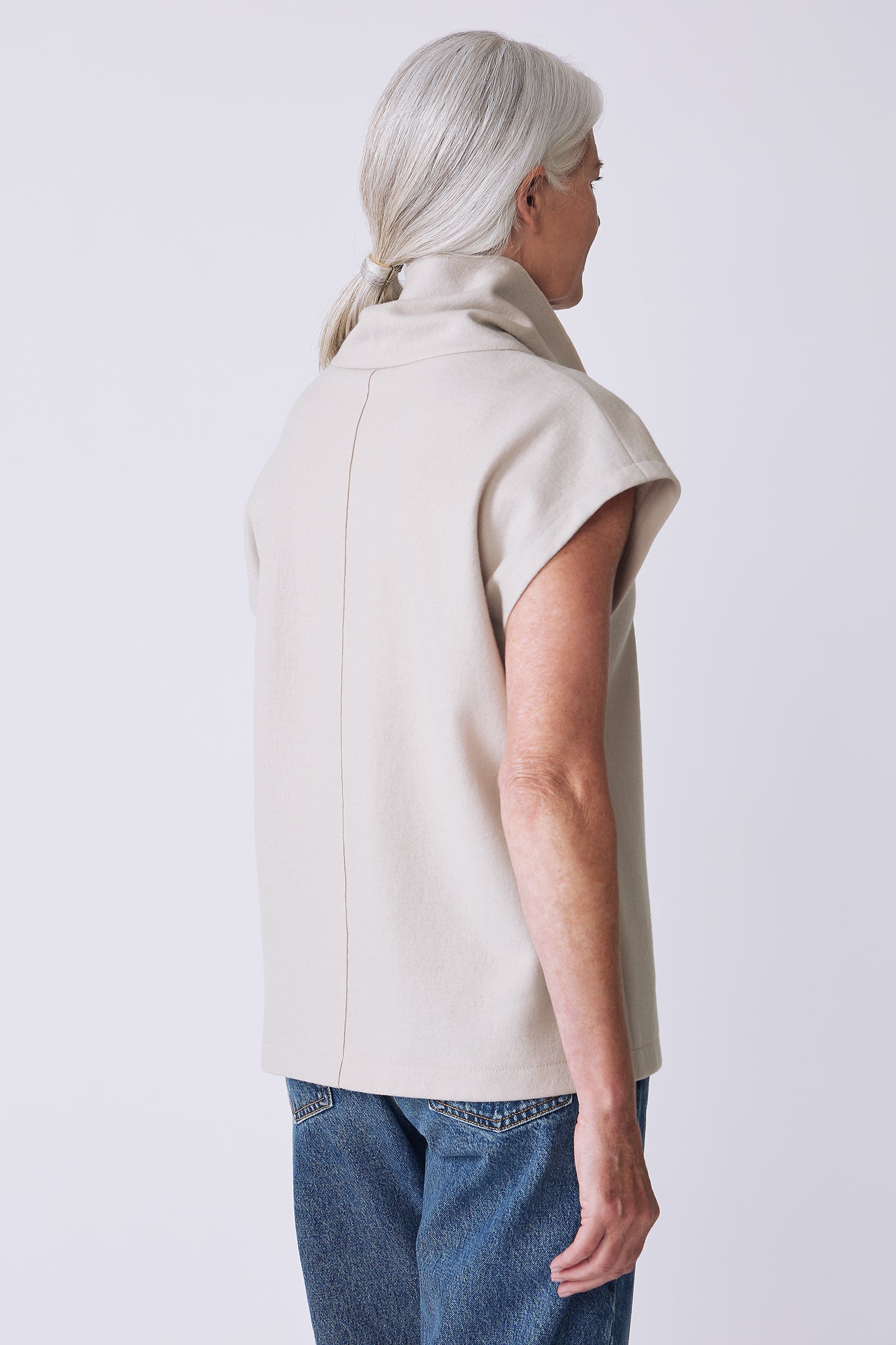 Kal Rieman Raw Edge Seam Tneck in Mink Felted Jersey on model front view walking