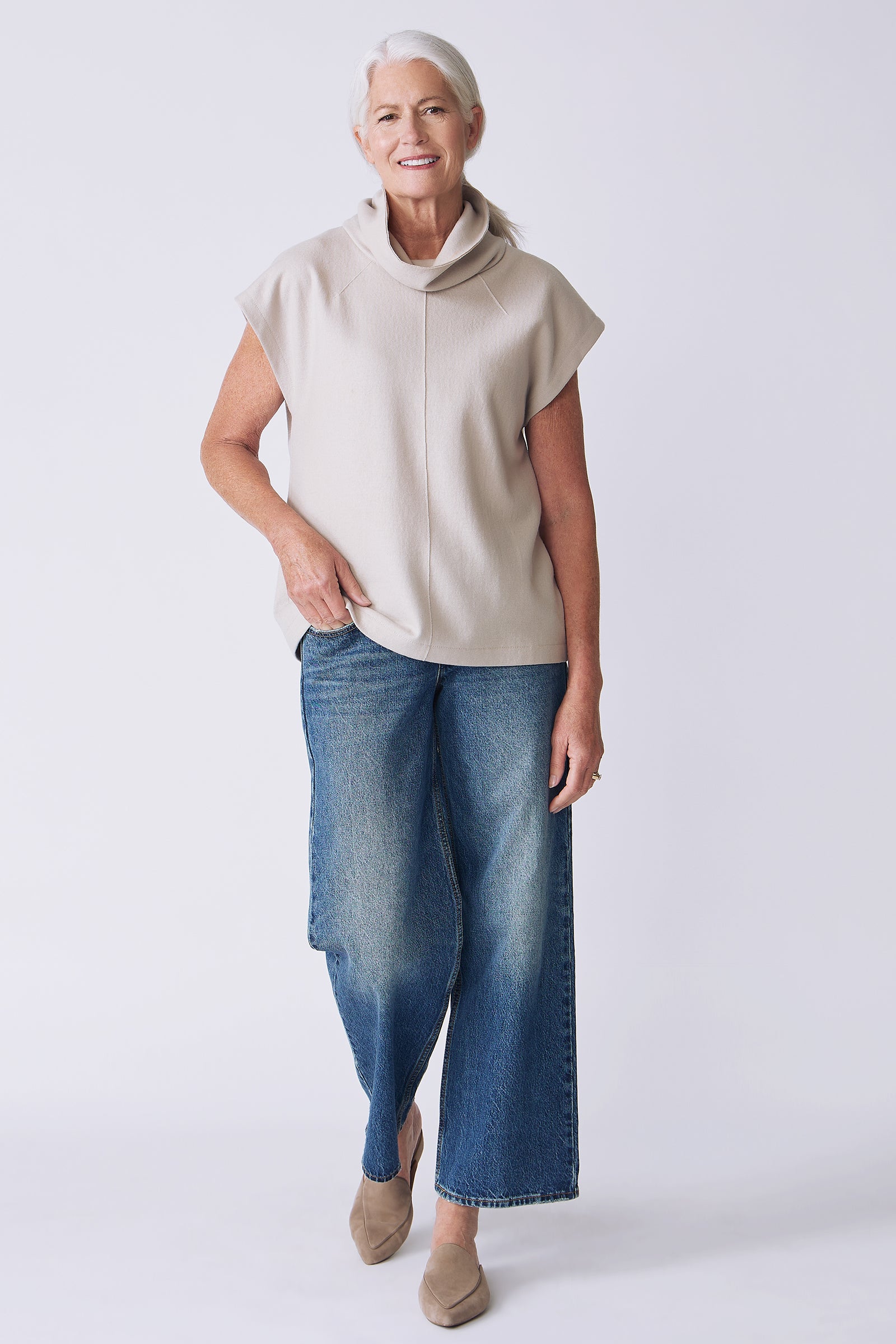 Kal Rieman Raw Edge Seam Tneck in Mink Felted Jersey on model front view walking
