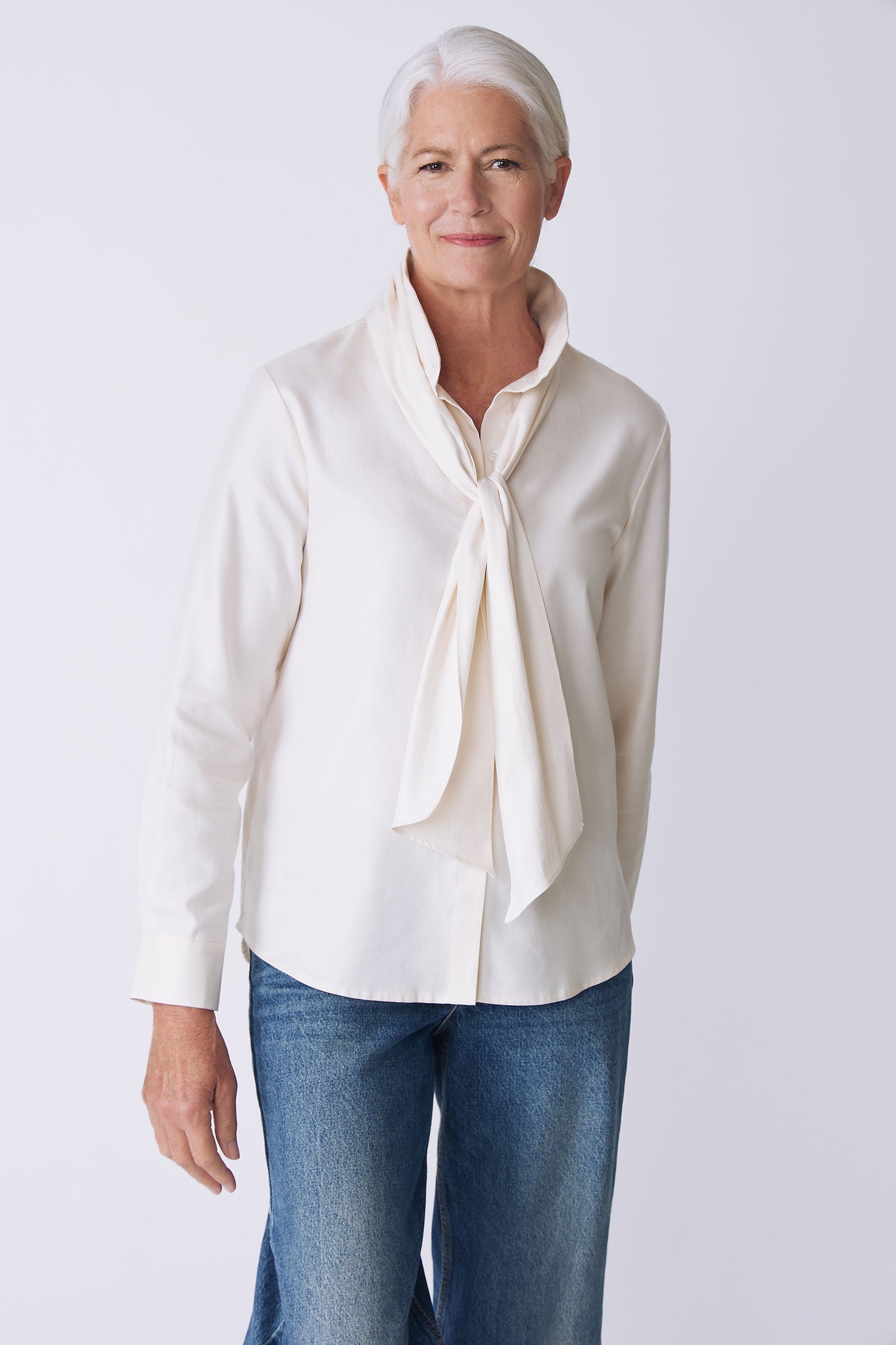 Kal Rieman Regency Blouse in ivory soft twill on model front view detail walking