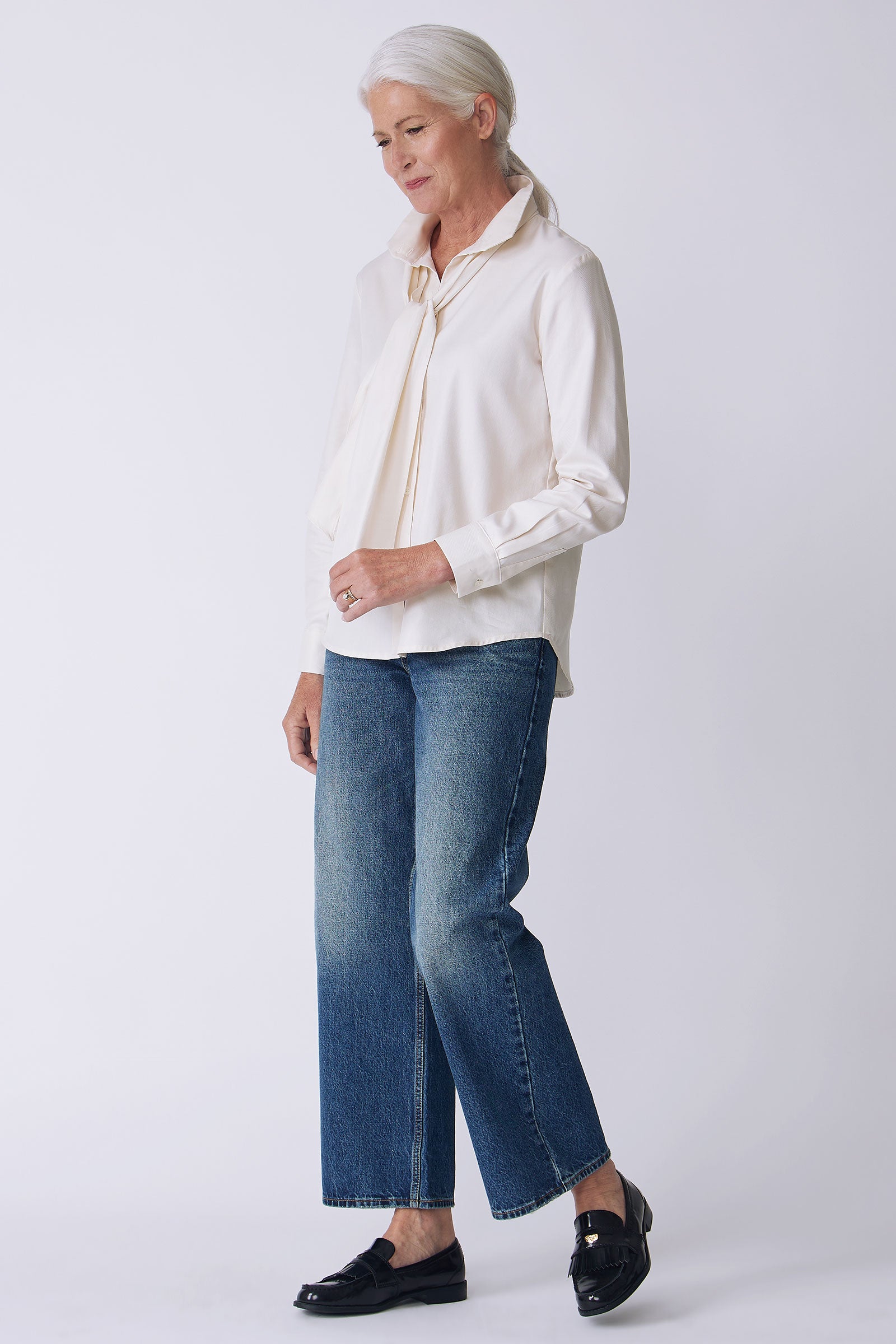 Kal Rieman Regency Blouse in ivory soft twill on model side view full look walking