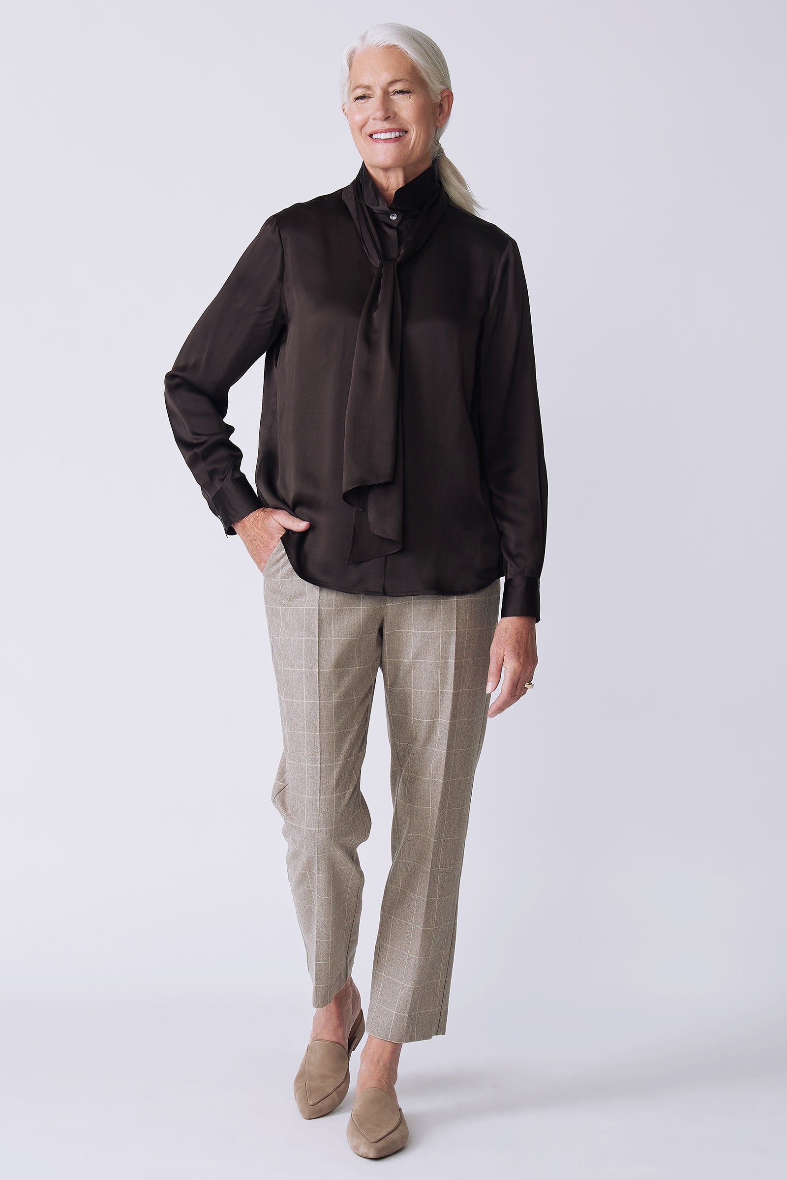 Kal Rieman Regency Silk Blouse in espresso color charmeuse on model side view hand in pocket walking