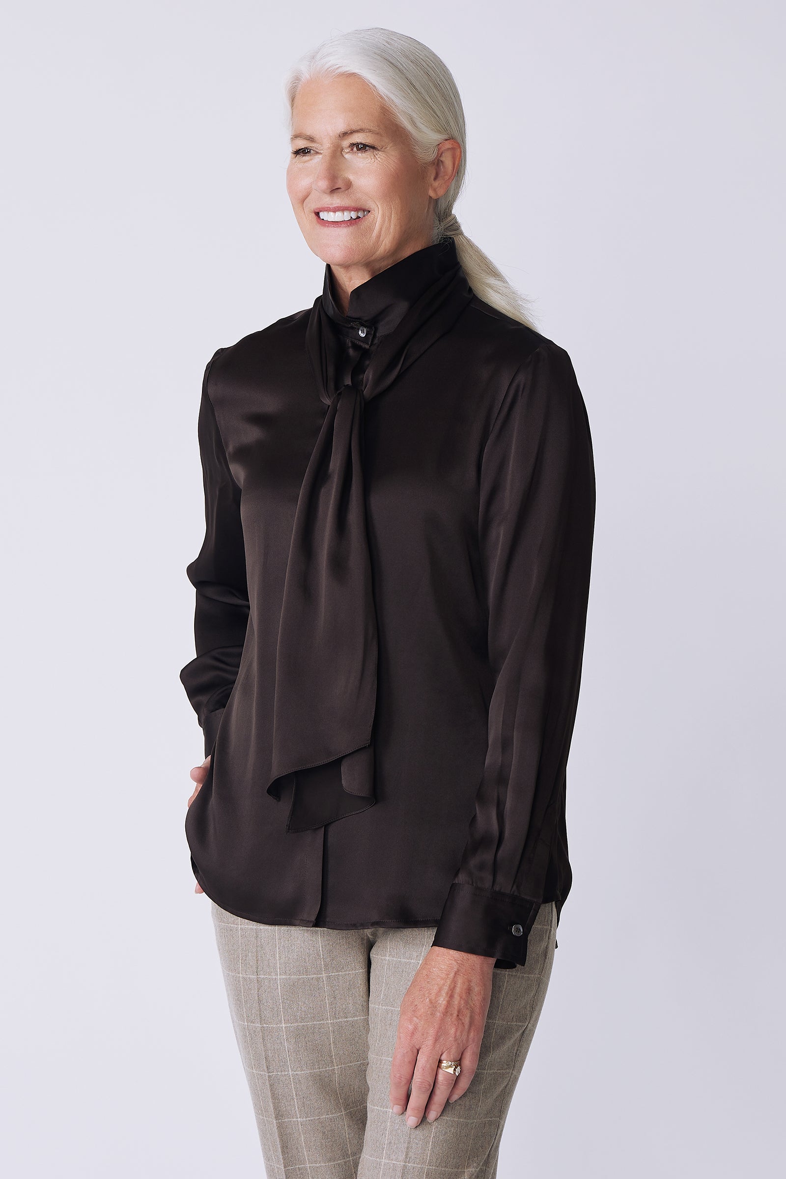 Kal Rieman Regency Silk Blouse in espresso color charmeuse on model side view hand in pocket