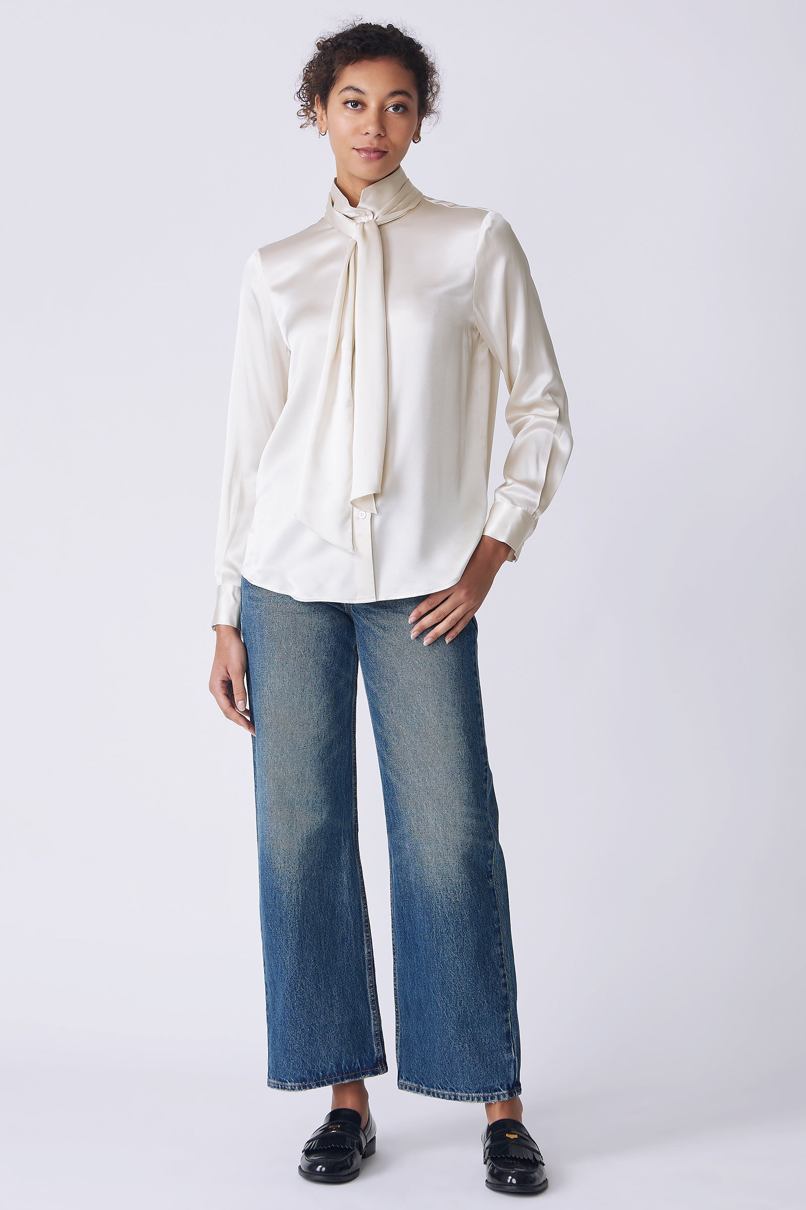 Kal Rieman Regency Silk Blouse in oyster color charmeuse on model front view hand in pocket