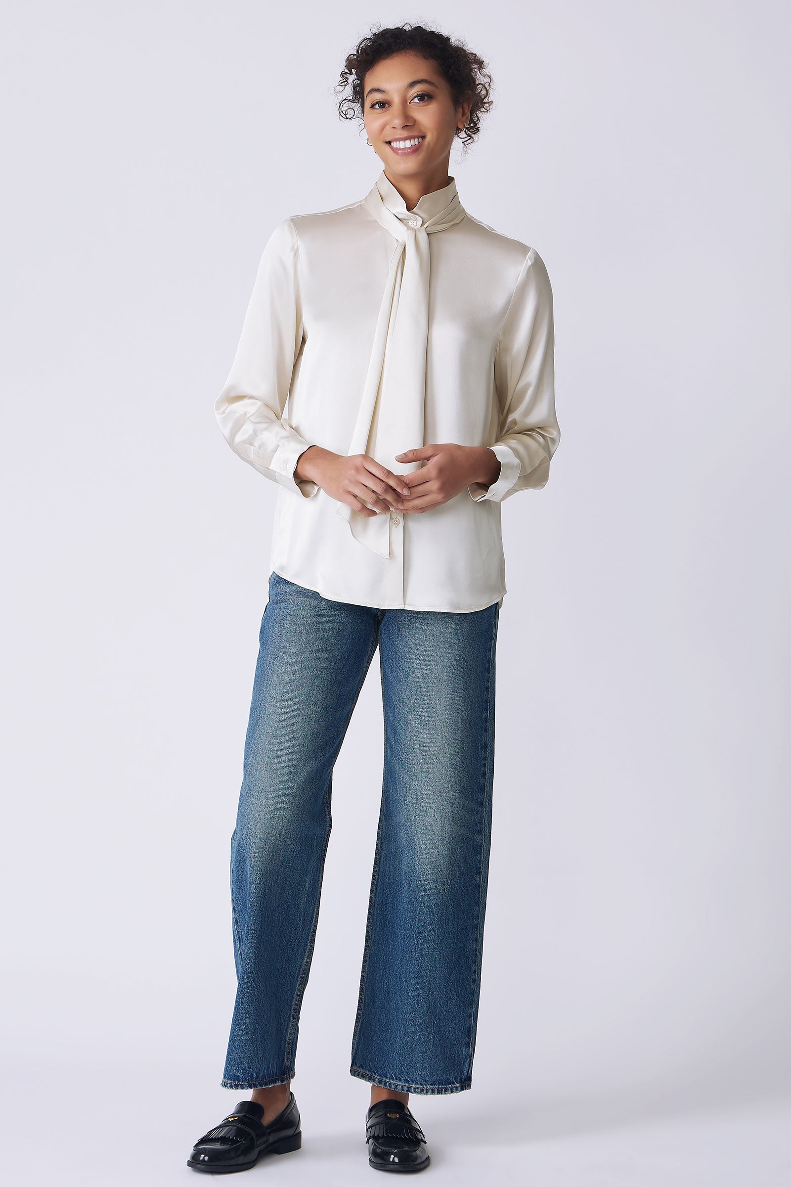 Kal Rieman Regency Silk Blouse in oyster color charmeuse on model front view holding hands