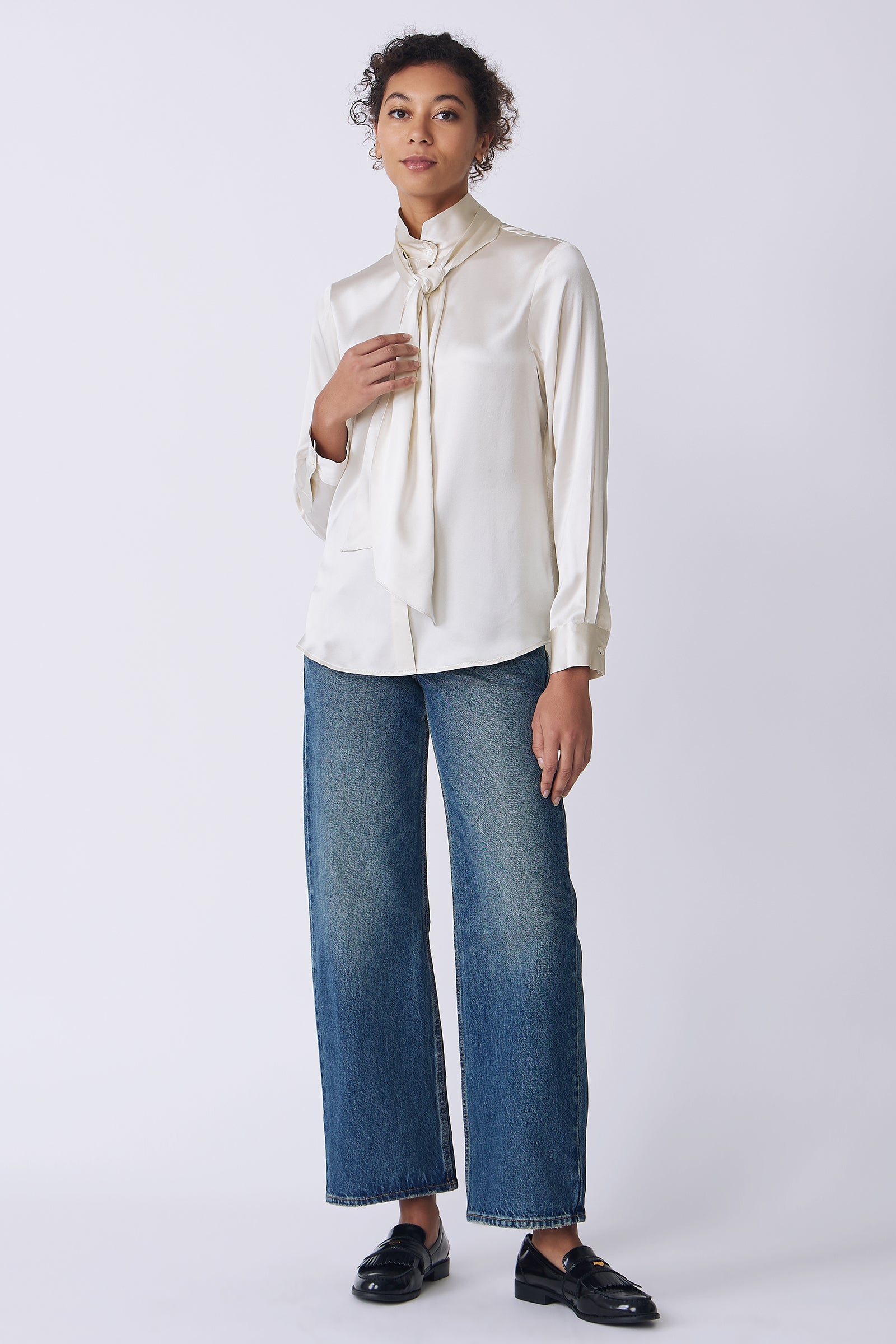 Kal Rieman Regency Silk Blouse in oyster color charmeuse on model front view holding scarf