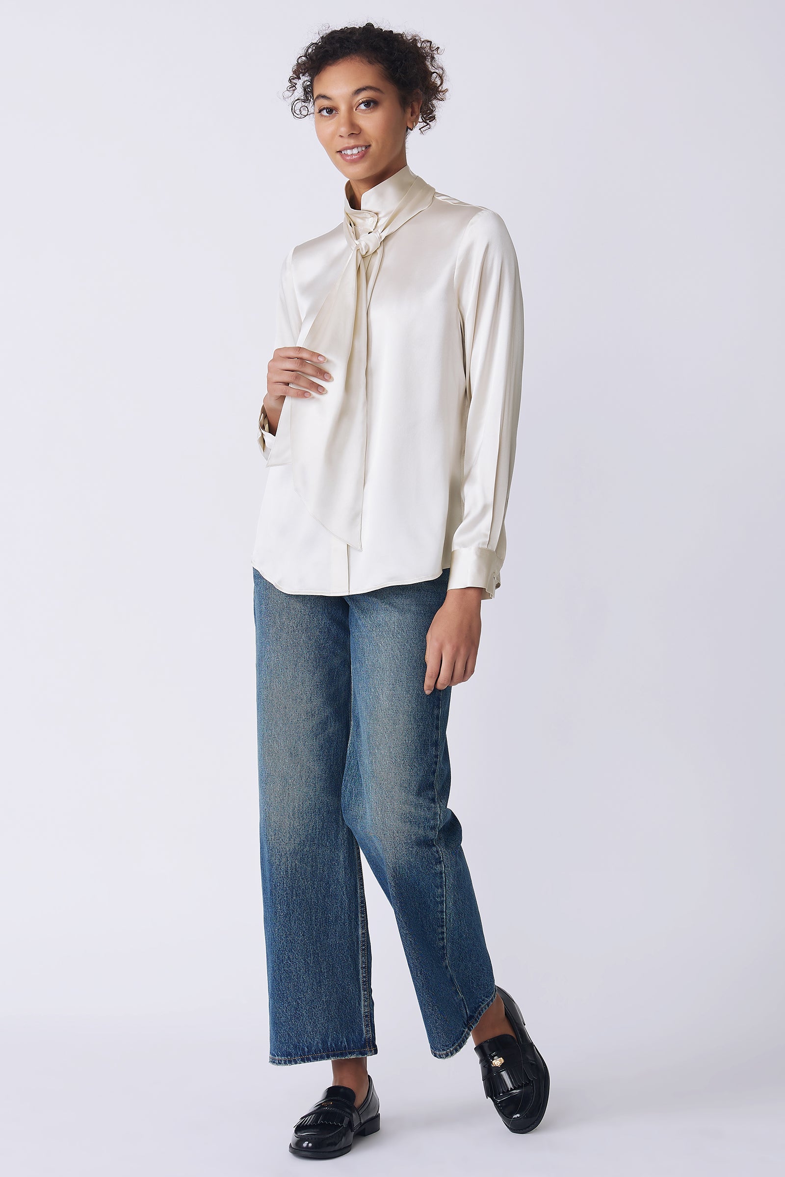 Kal Rieman Regency Silk Blouse in oyster color charmeuse on model side view walking