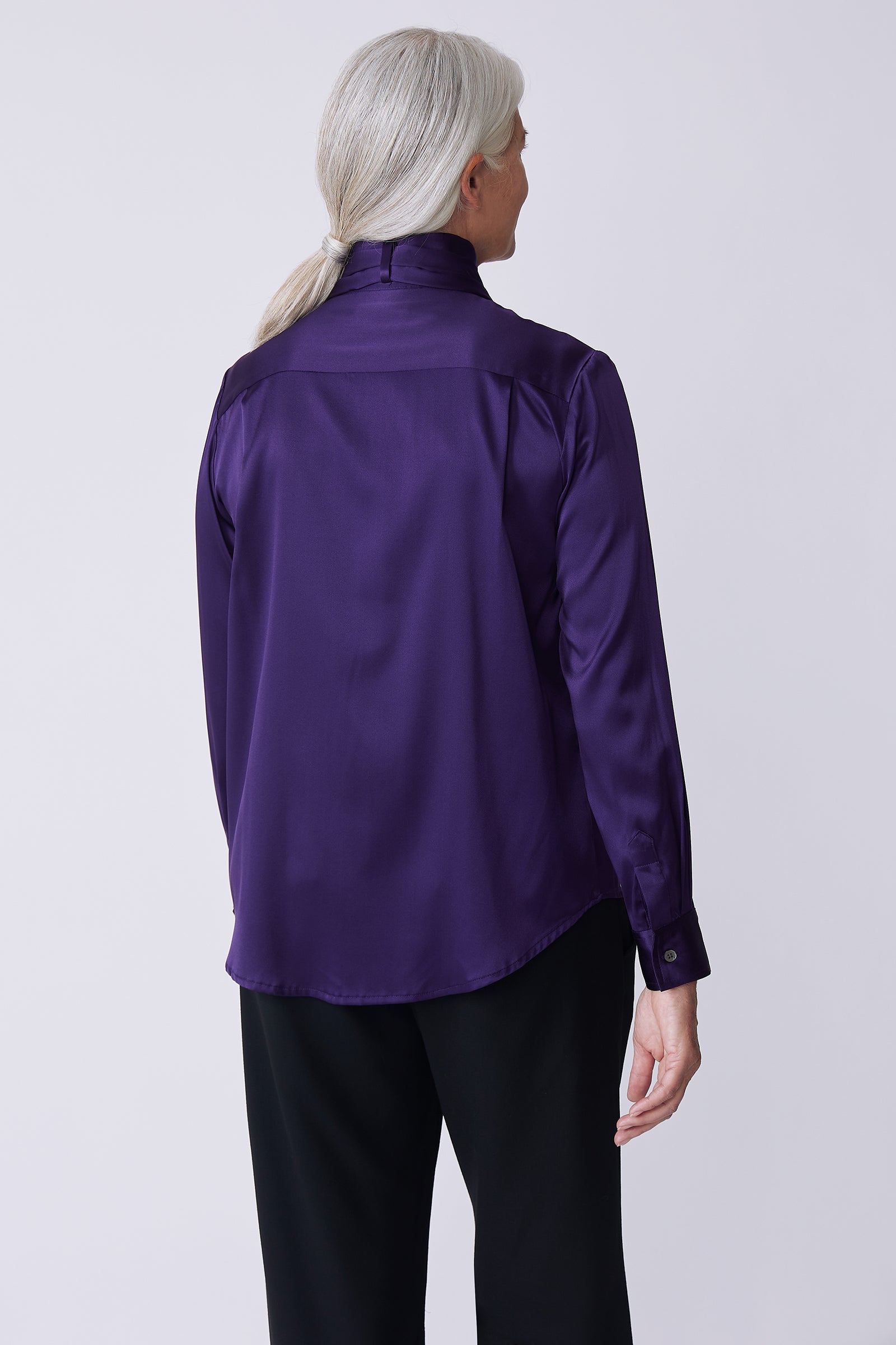 Kal Rieman Regency Silk Blouse in royal purple color charmeuse on model back view