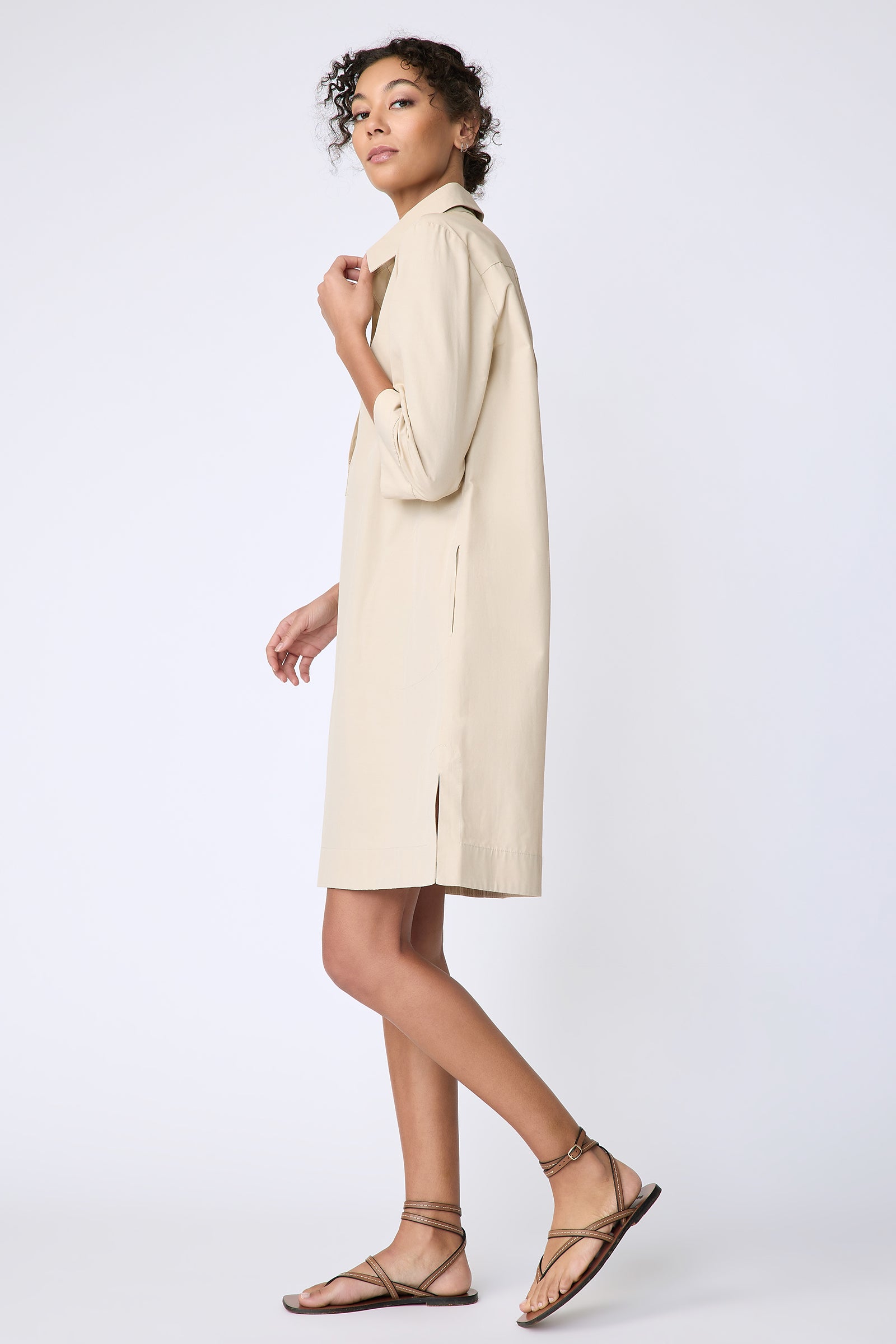 Kal Rieman Rene Placket Dress in Italian Broadcloth color sand on model side view walking