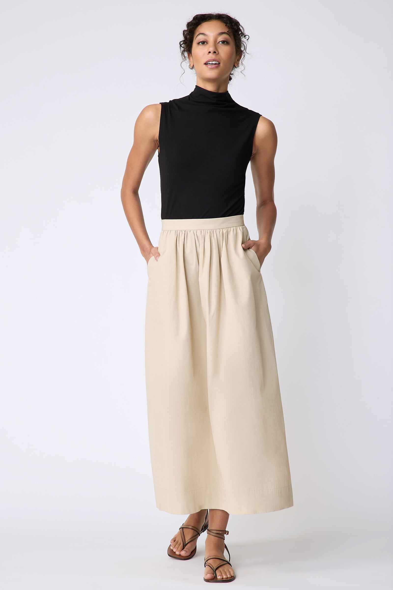 Kal Rieman Sadie Skirt in Italian Broadcloth color sand on model front view walking