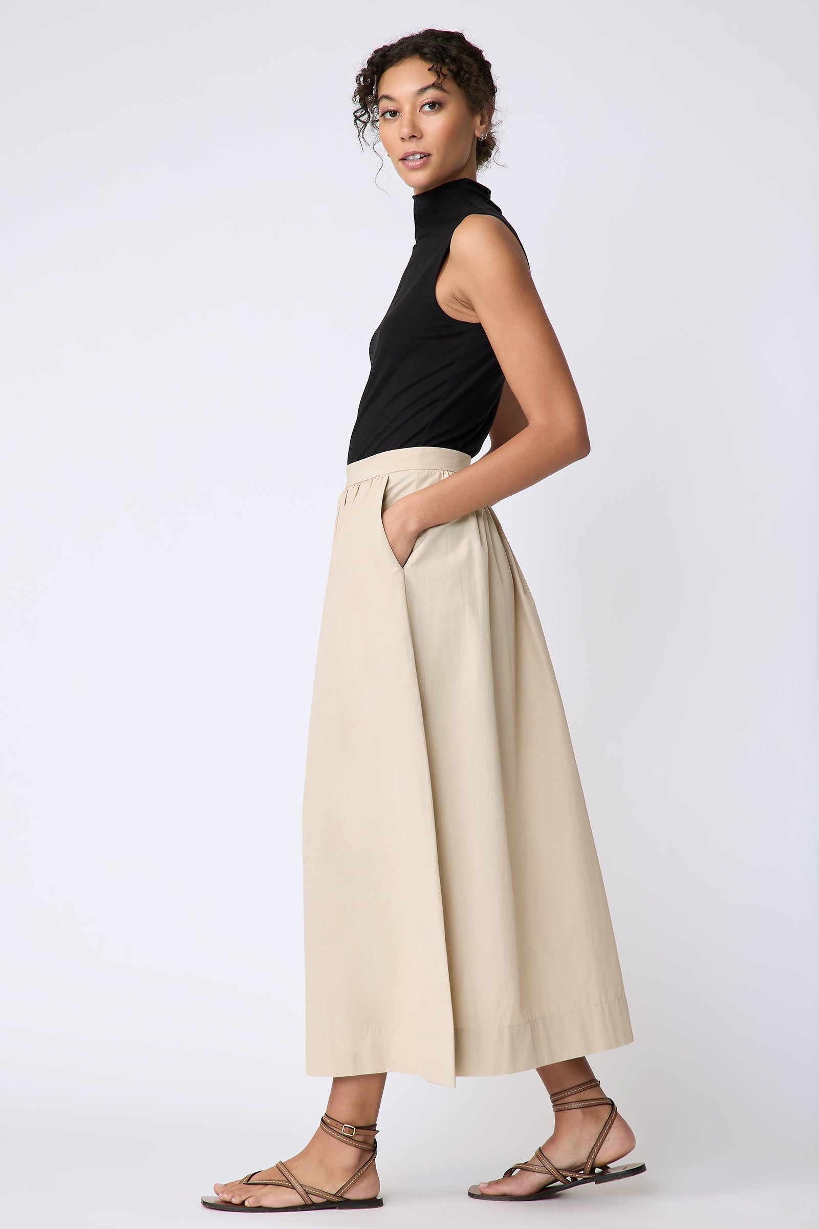 Kal Rieman Sadie Skirt in Italian Broadcloth color sand on model side view walking