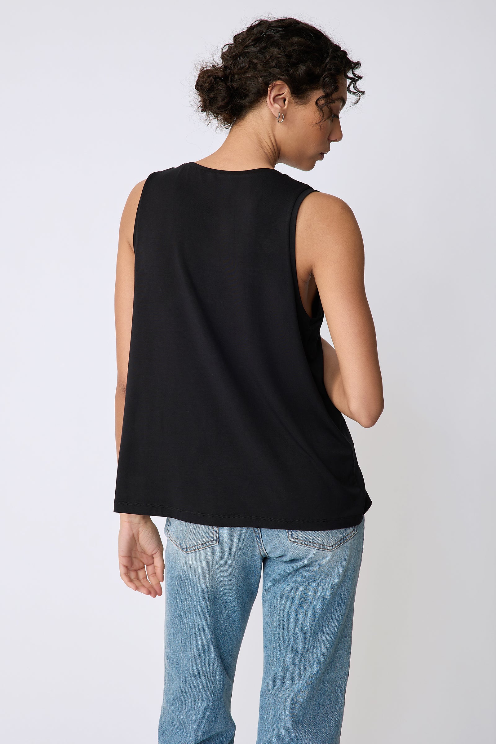 Kal Rieman Sandra Scoop Tank in black bamboo jersey on model back view