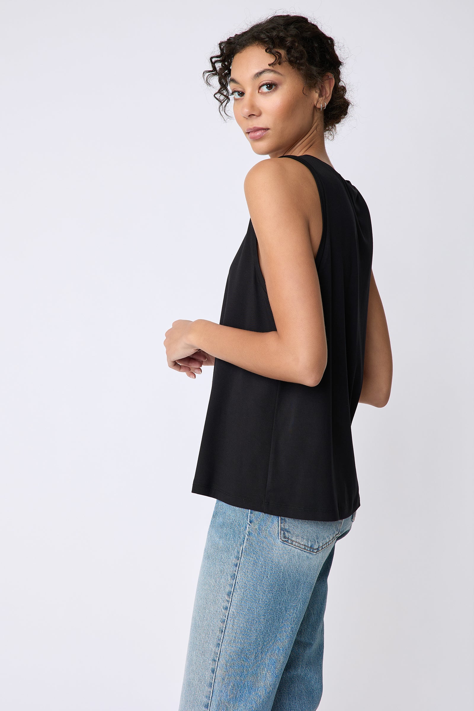 Kal Rieman Sandra Scoop Tank in  black bamboo jersey on model side view
