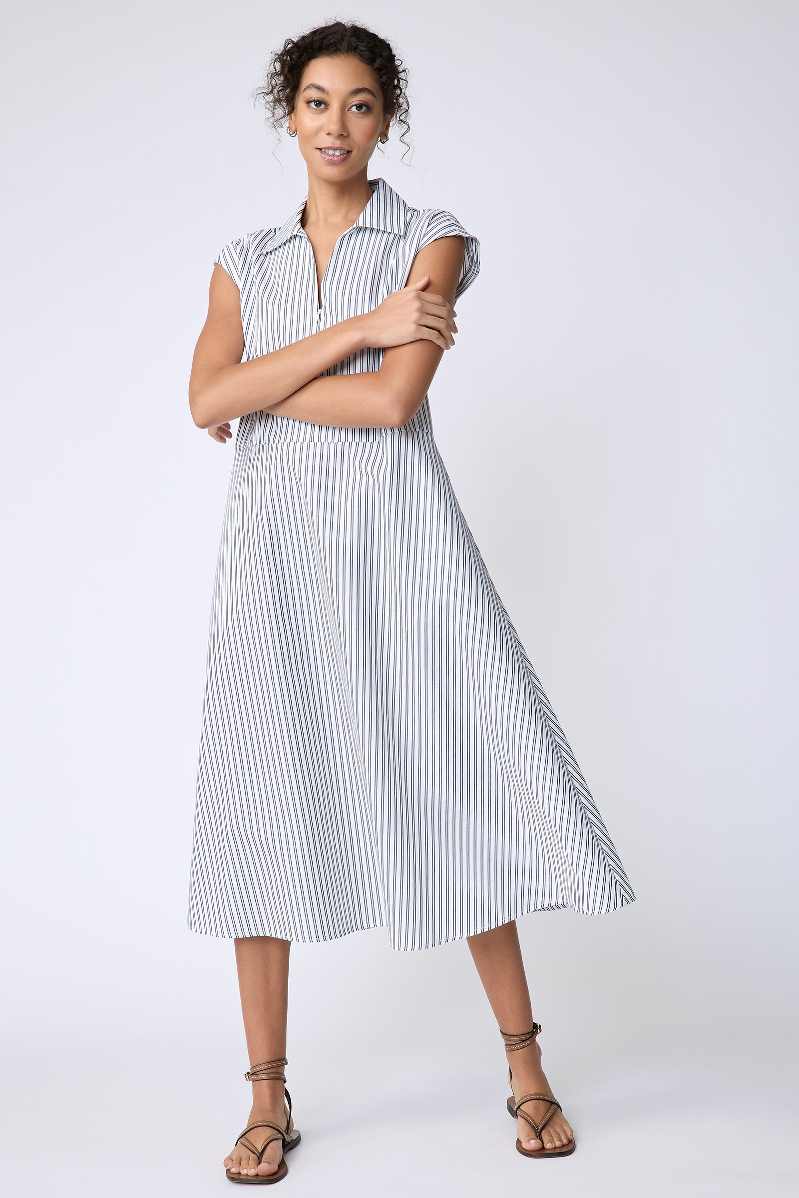 Kal Rieman Savannah Dress in European Cotton white with navy stripe on model front view arms crossed in front