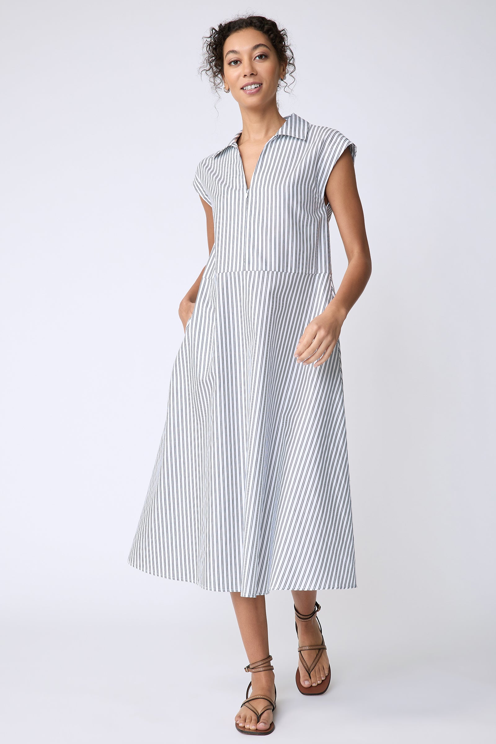 Kal Rieman Savannah Dress in European Cotton white with navy stripe on model front view walking