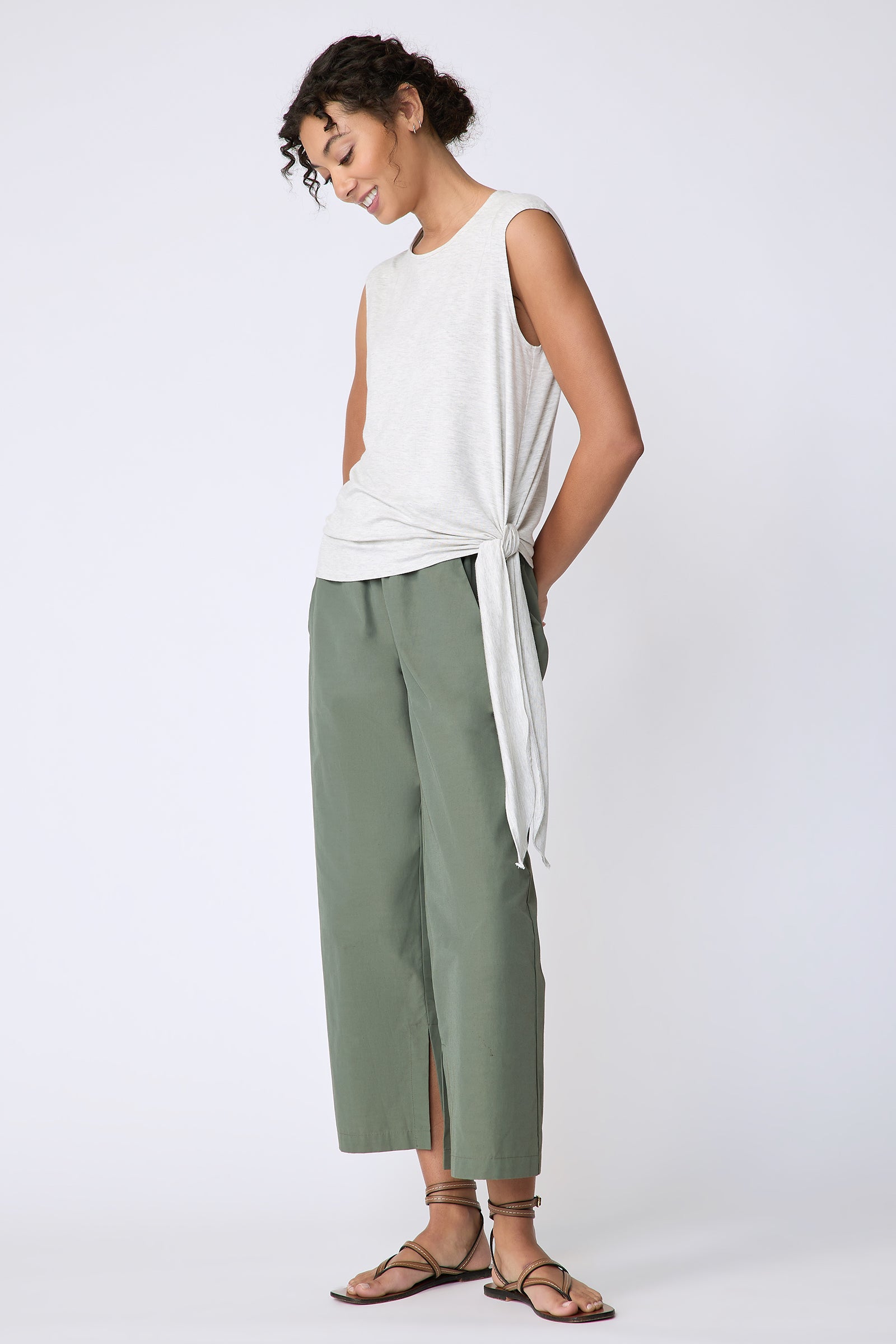 Kal Rieman Sonia Side Tie Tank in oatmeal on model front view full length hands behind back looking down
