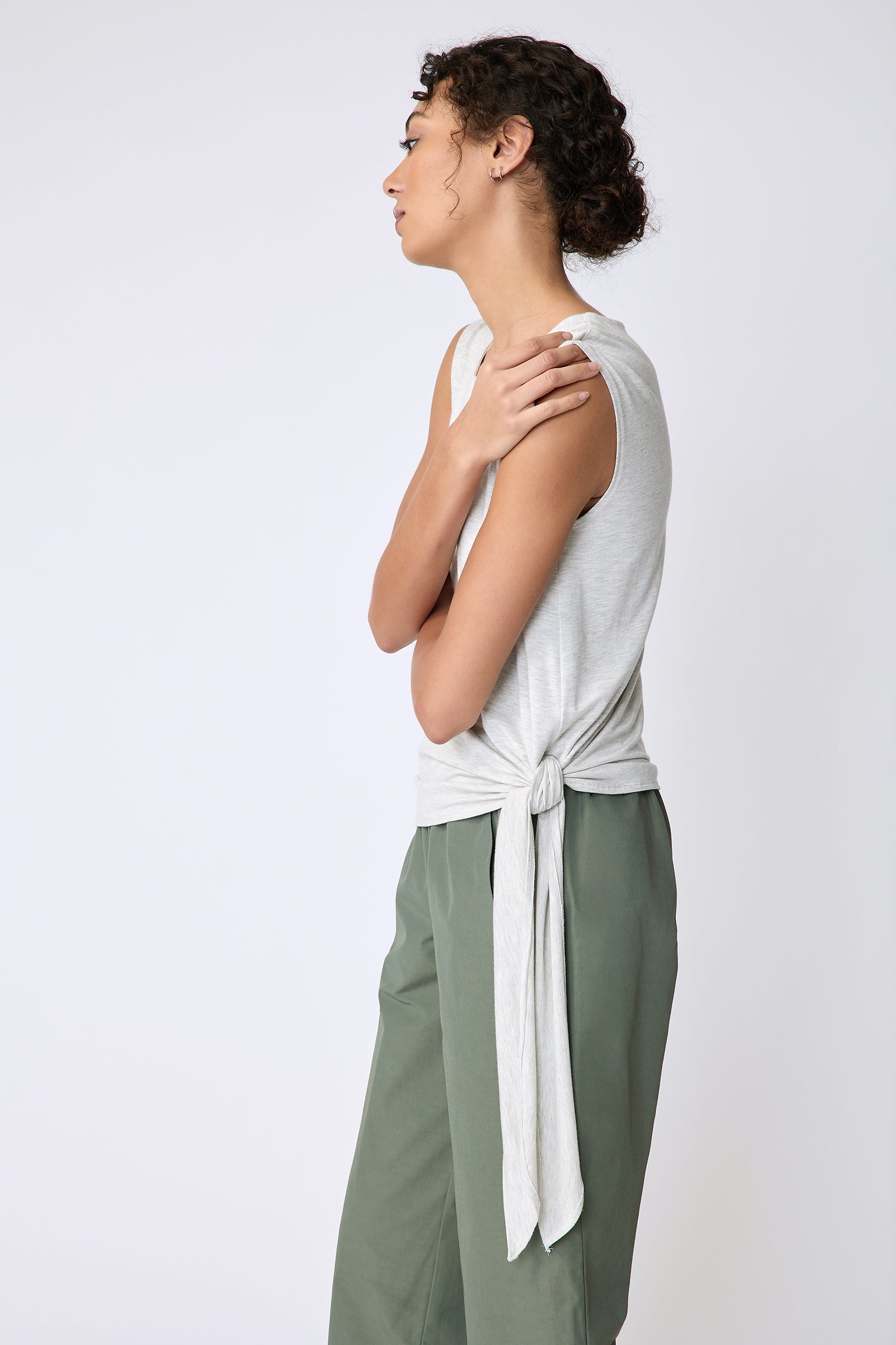 Kal Rieman Sonia Side Tie Tank in oatmeal on model side view arms crossed in front