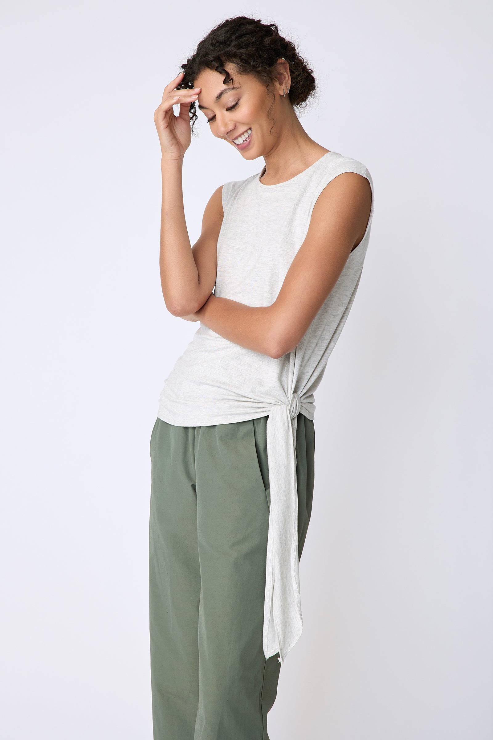 Kal Rieman Sonia Side Tie Tank in oatmeal on model side view hand on forehead