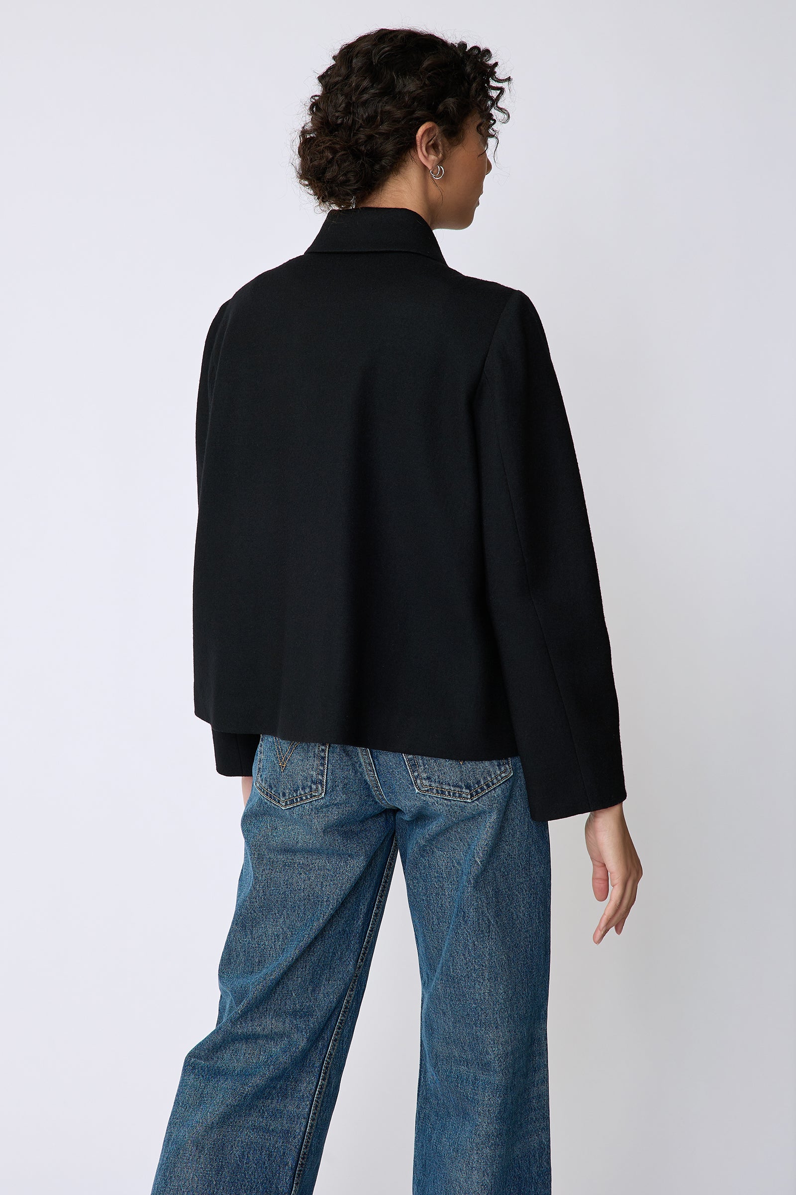 Kal Rieman Sylvie Swing Jacket in black felted jersey on model back view
