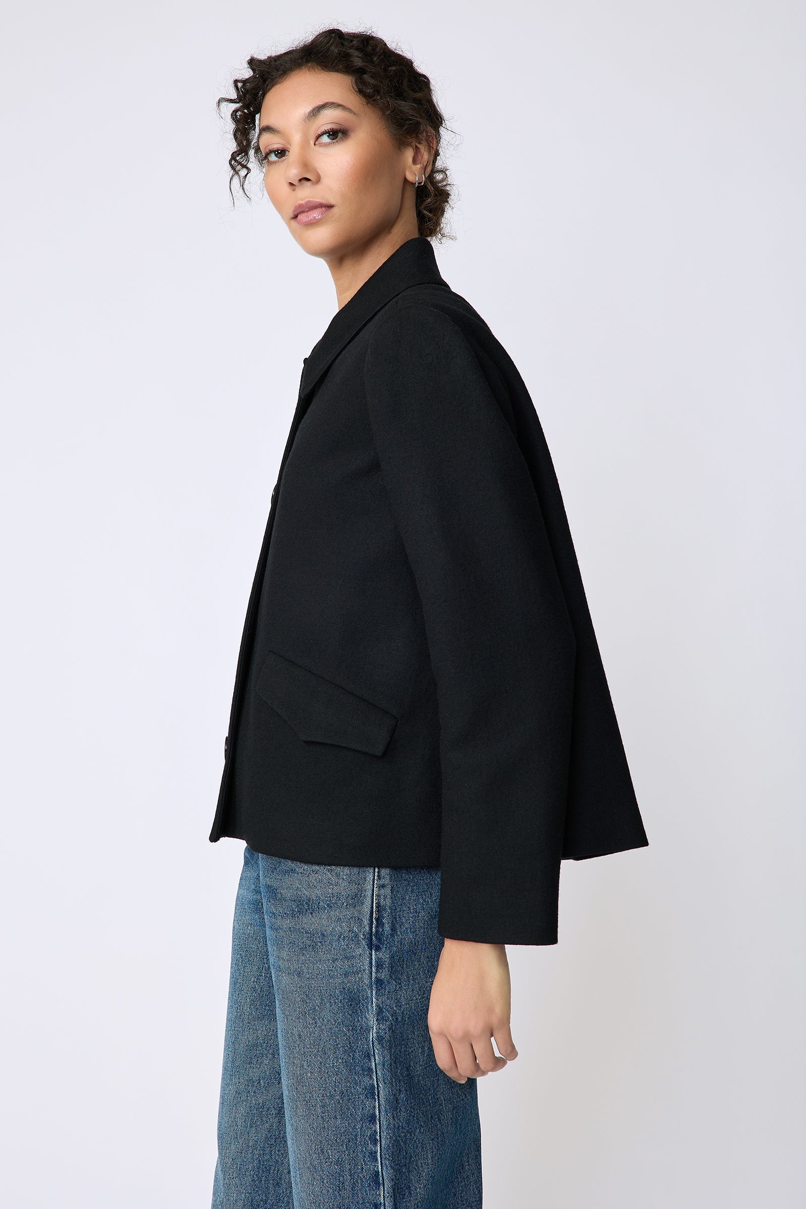 Kal Rieman Sylvie Swing Jacket in black felted jersey on model side view