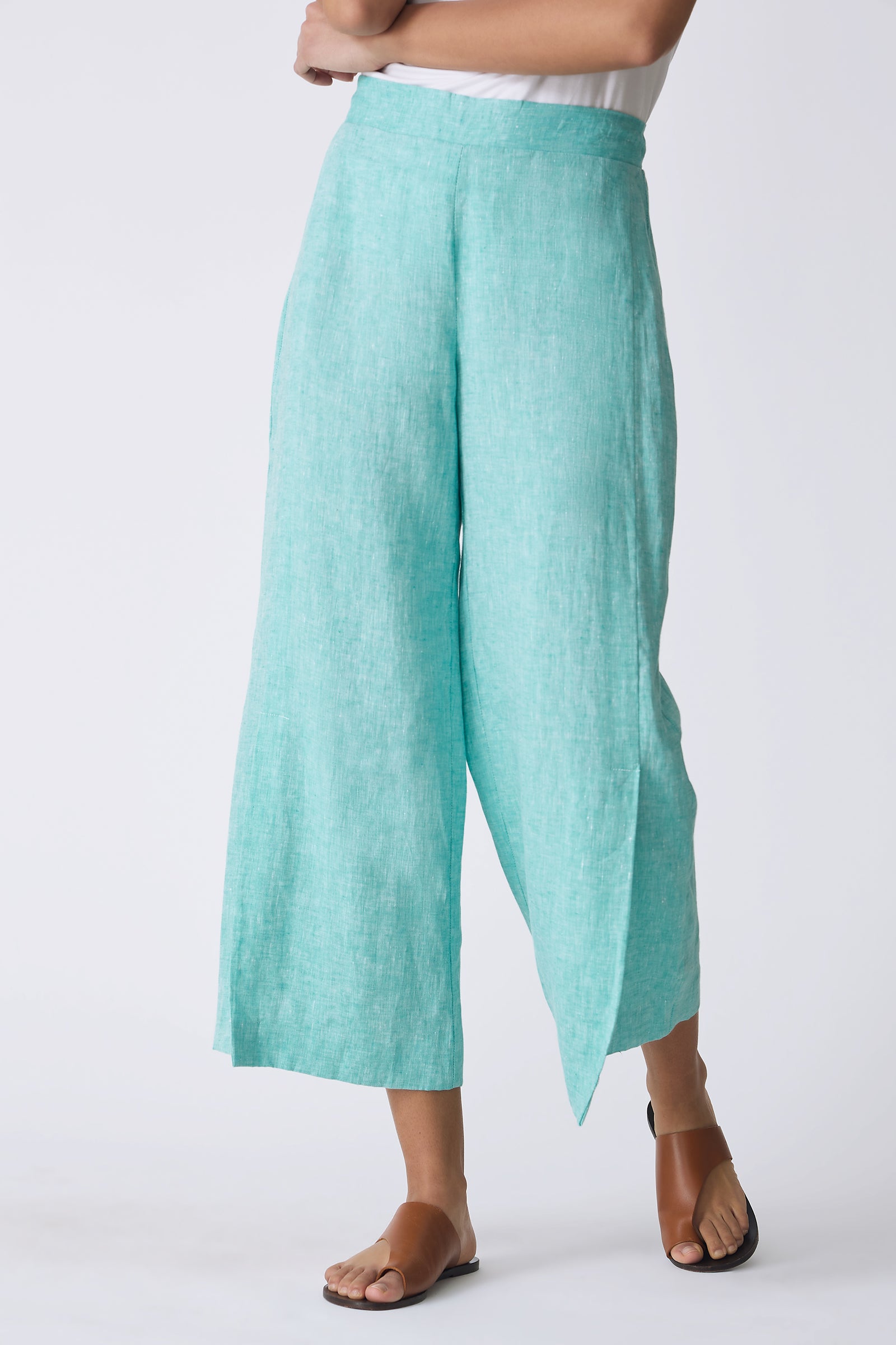 Kal Rieman Tami Side Kick Pant in Green on model with arms crossed front detail view