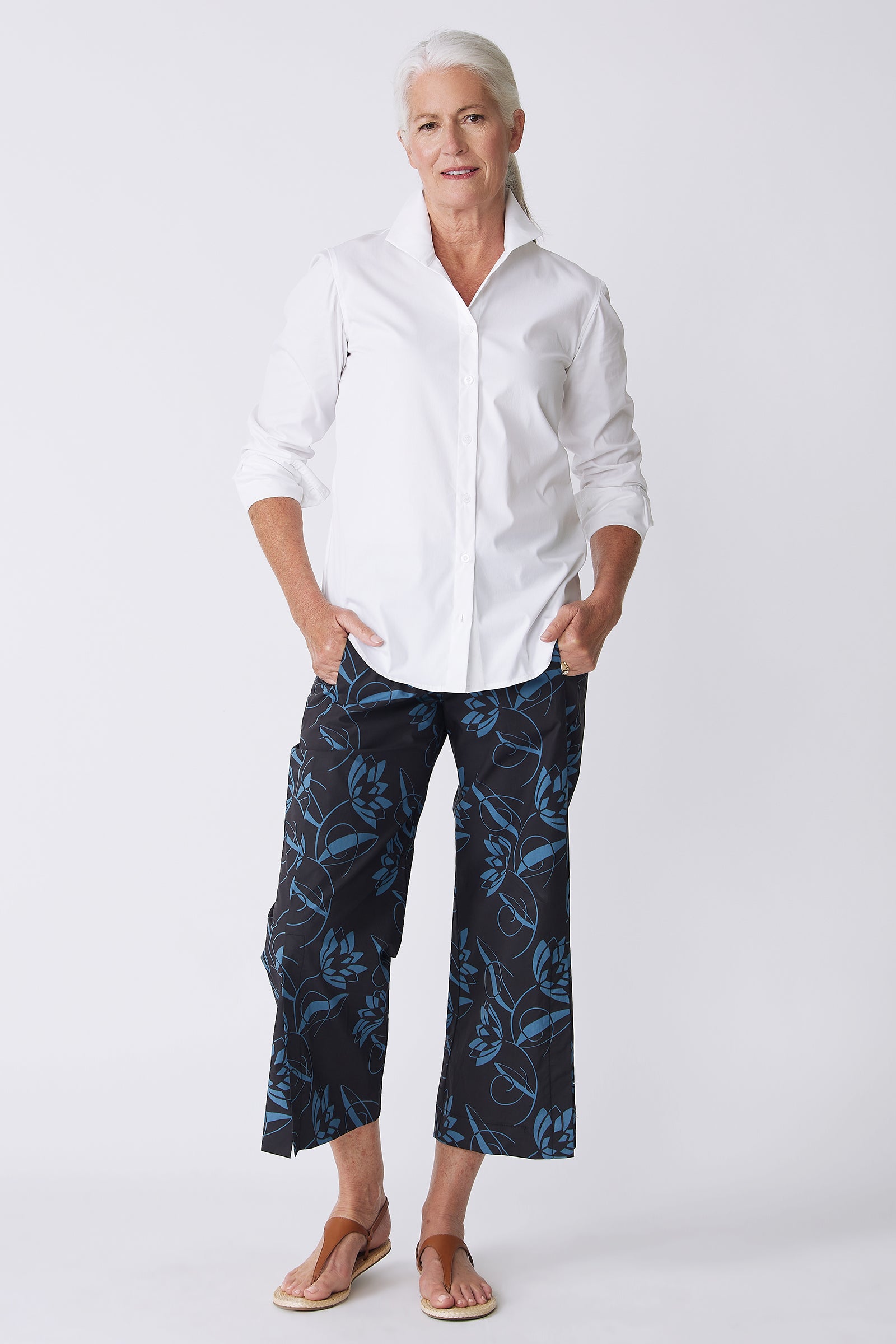 Kal Rieman Tami Side Kick Pant in Lotus Print Blue on model with hands in pockets