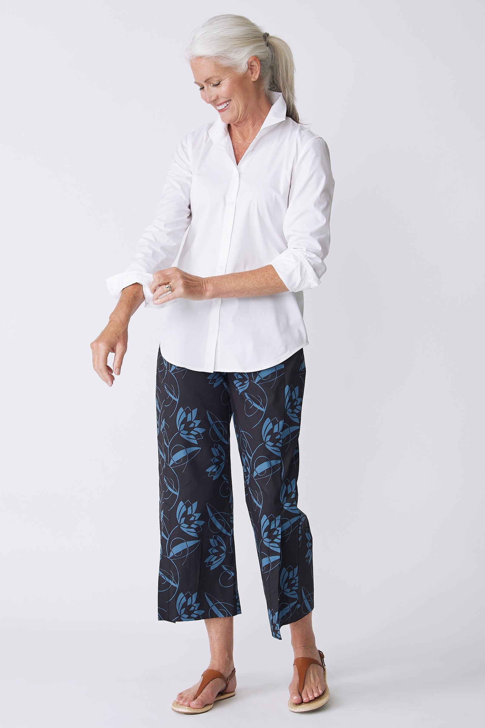 Kal Rieman Tami Side Kick Pant in Lotus Print Blue on model holding cuff
