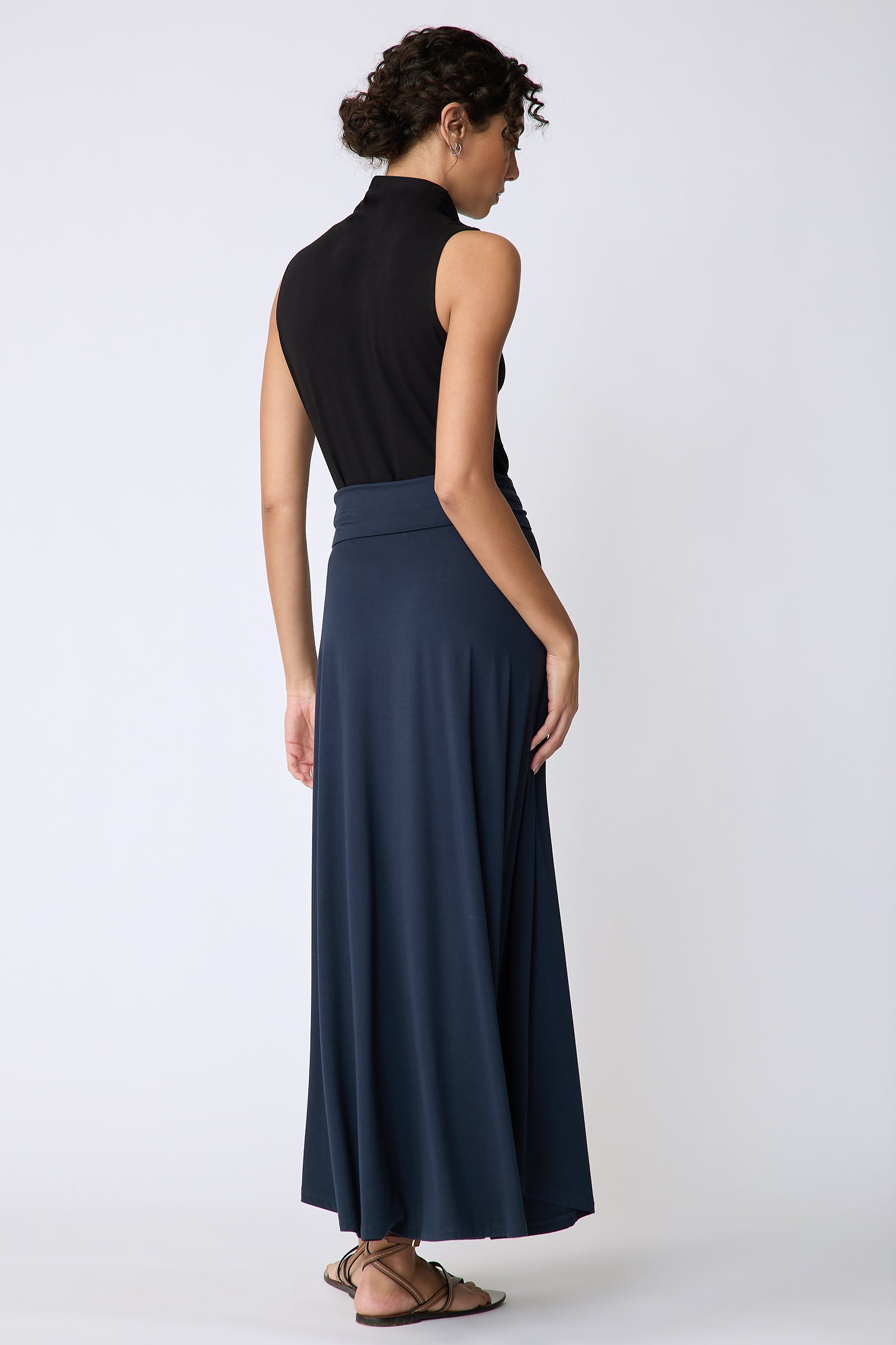 Kal Rieman Thea Kick Skirt in navy bamboo jersey on model back view