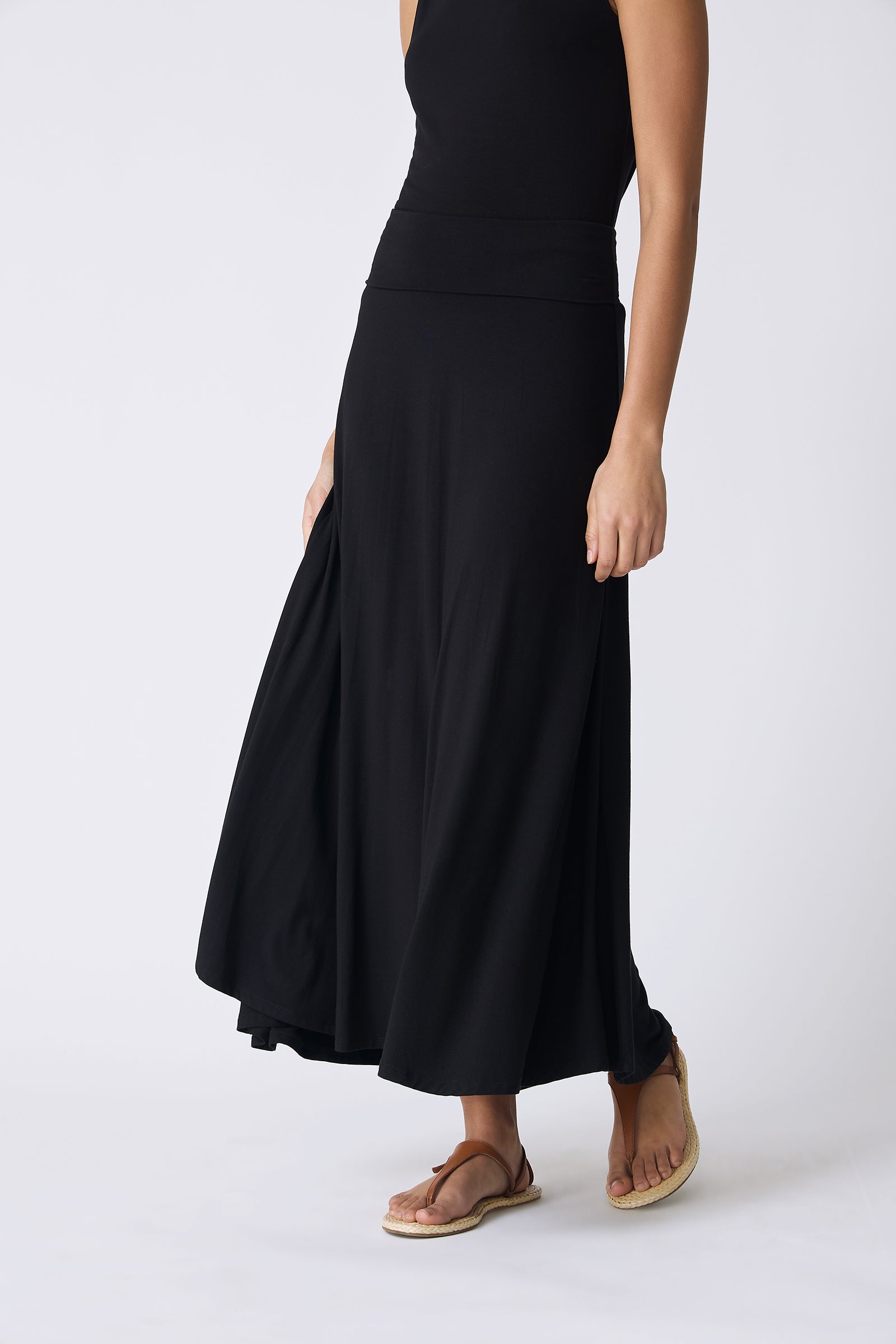 Kal Rieman Thea Knit Kick Skirt in Black on model walking front detail view