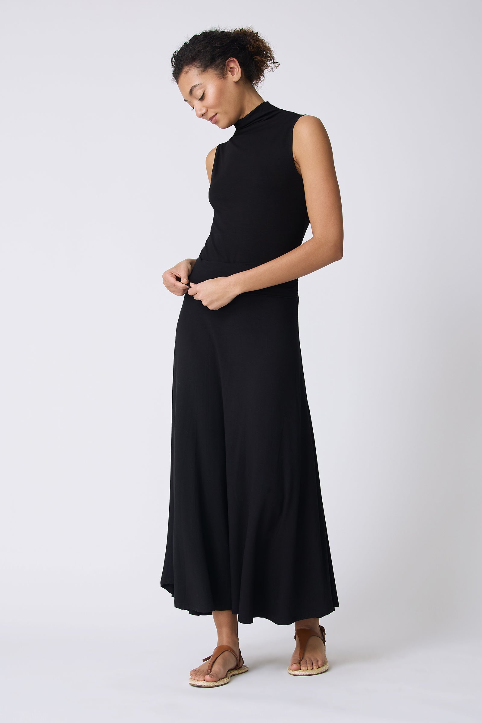Kal Rieman Thea Knit Kick Skirt in Black on model looking down full front view
