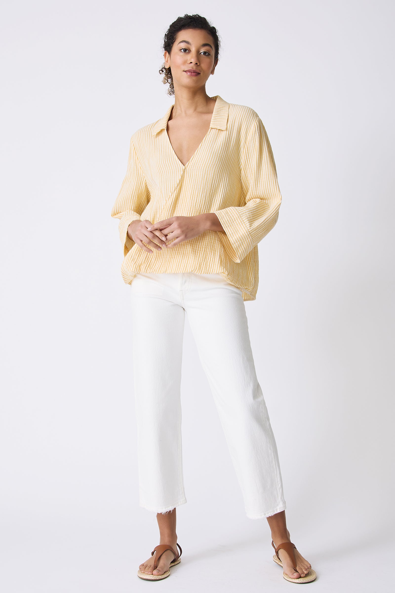 Kal Rieman Tropez Pullover in Honey Stripe on model with hands in front of body full front view