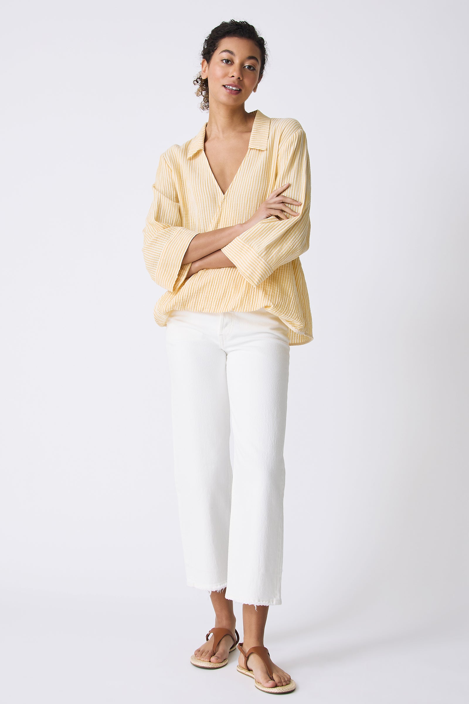 Kal Rieman Tropez Pullover in Honey Stripe on model with arms crossed full front view