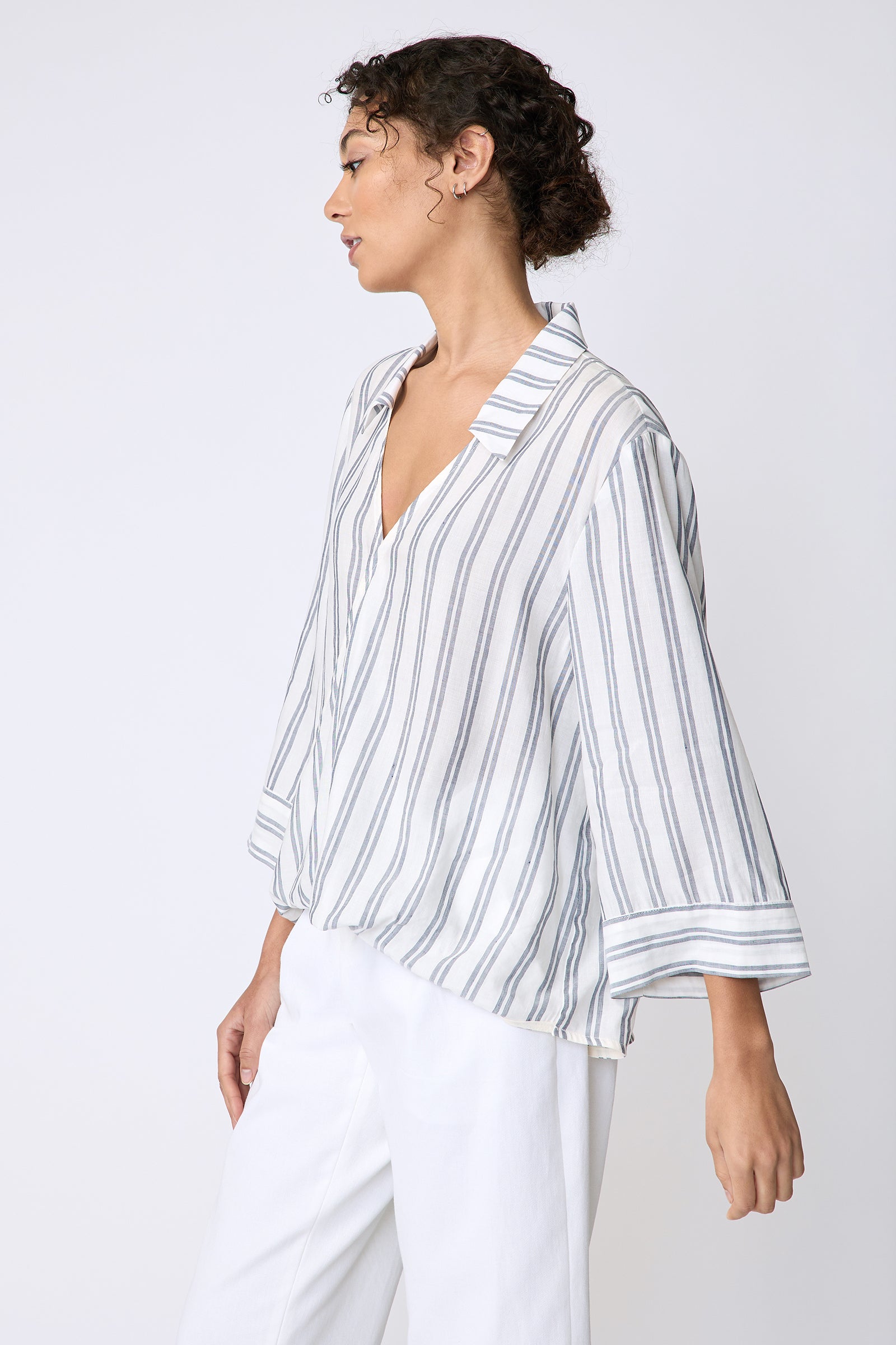 Kal Rieman Tropez Pullover in navy stripe on model side view