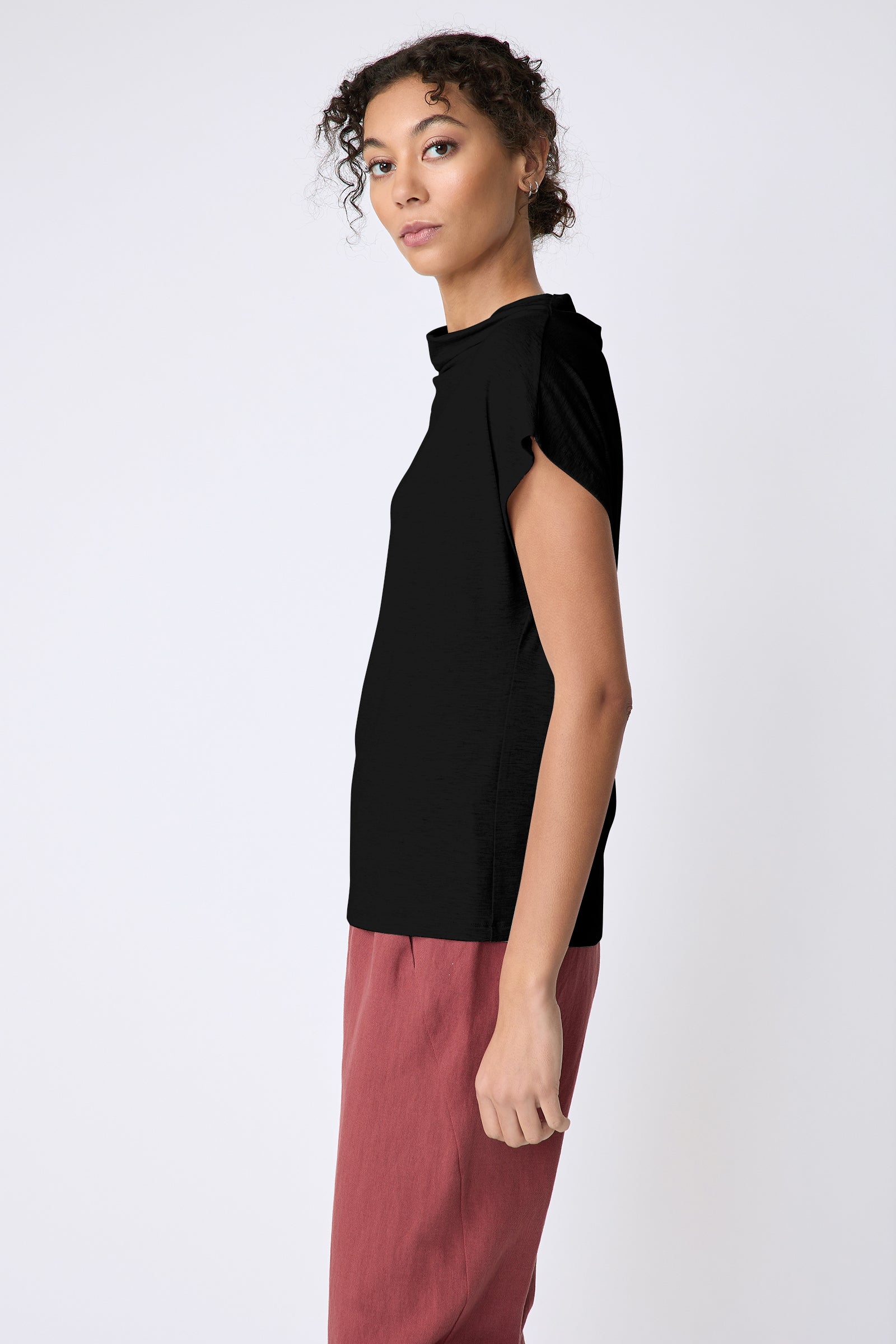 Kal Rieman Uma Funnelneck Tee in Black on model side view