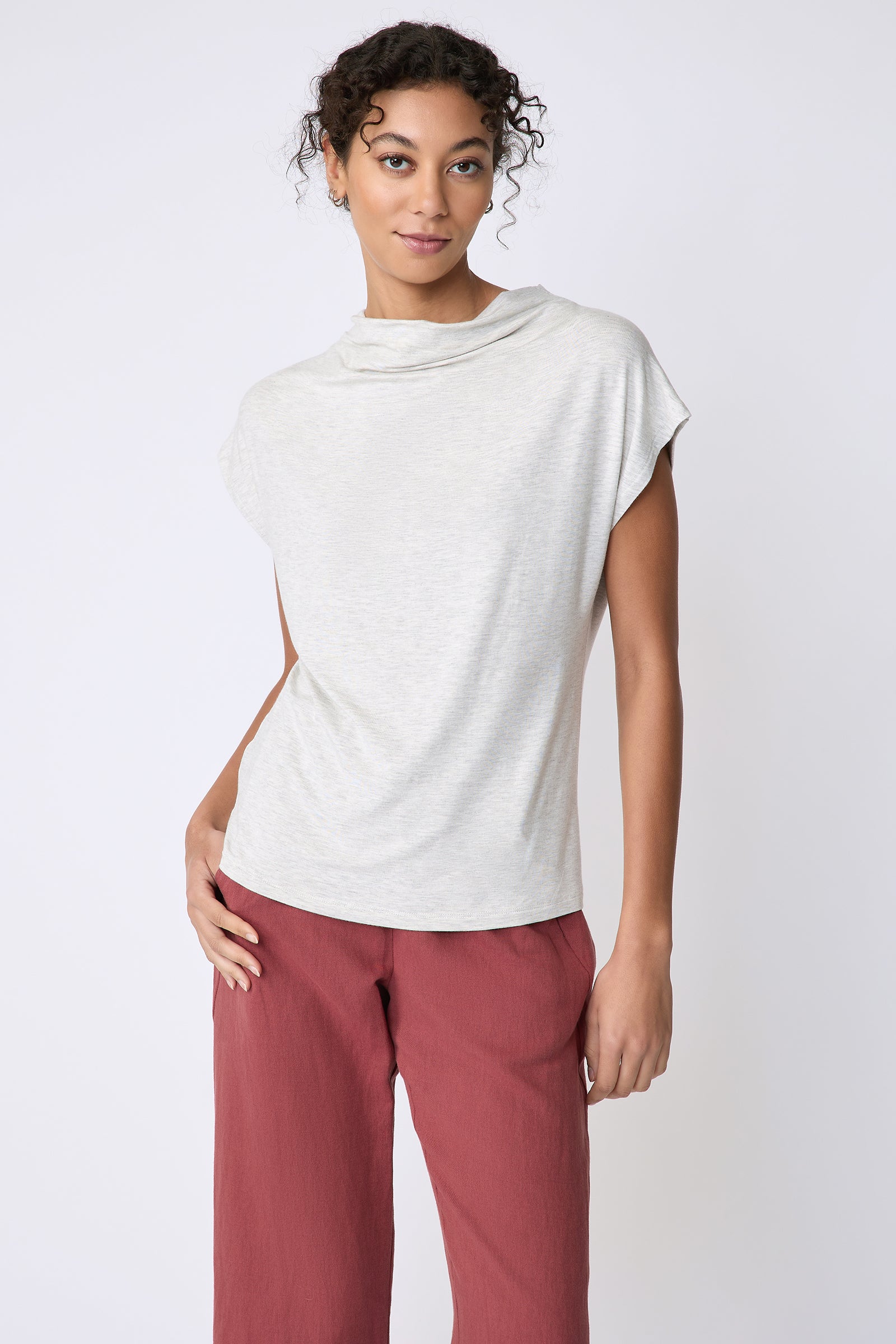 Kal Rieman Uma Funnelneck Tee in Oatmeal on model front view hand in pocket