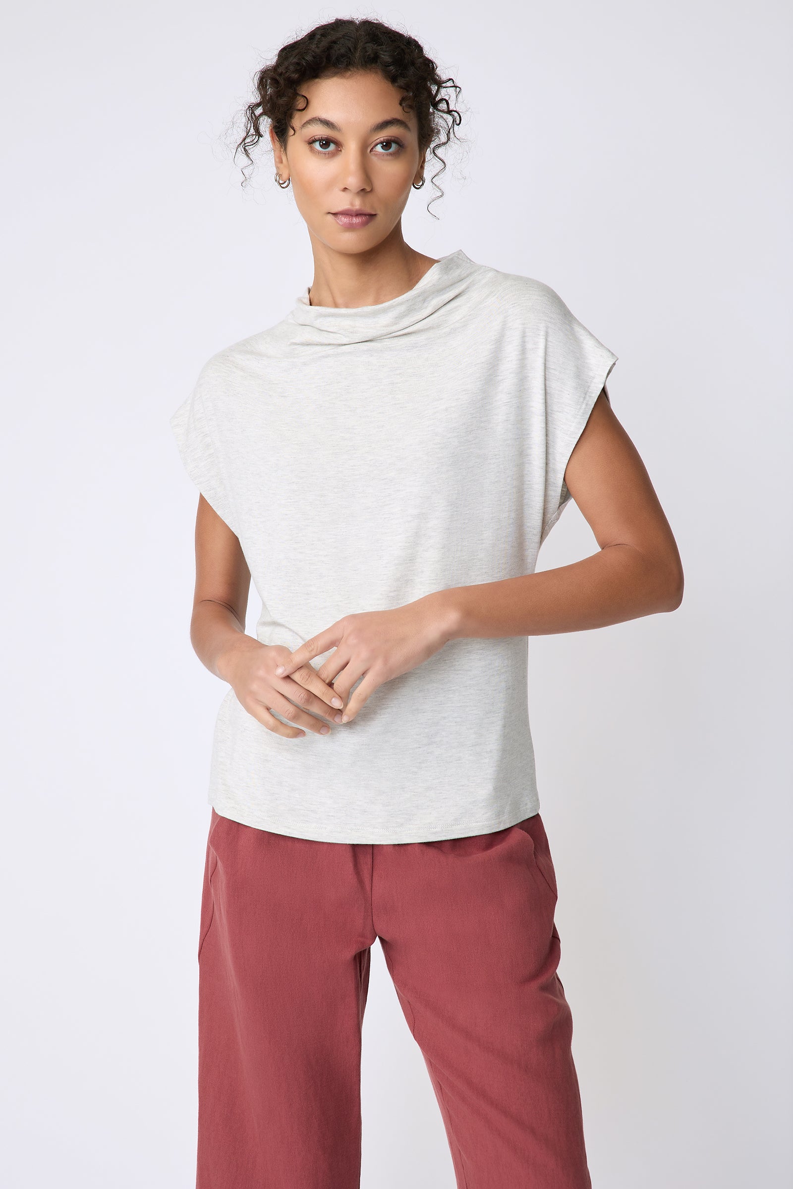 Kal Rieman Uma Funnelneck Tee in Oatmeal on model front view hands in front