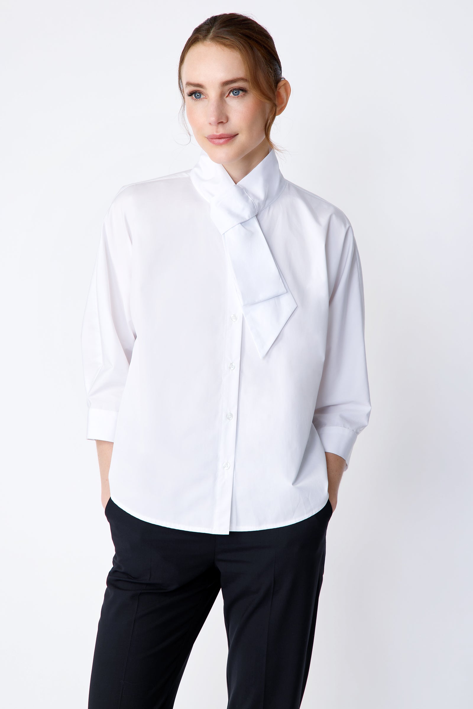 Kal Rieman Vanessa Bow Blouse in white poplin on model front view hands in pockets