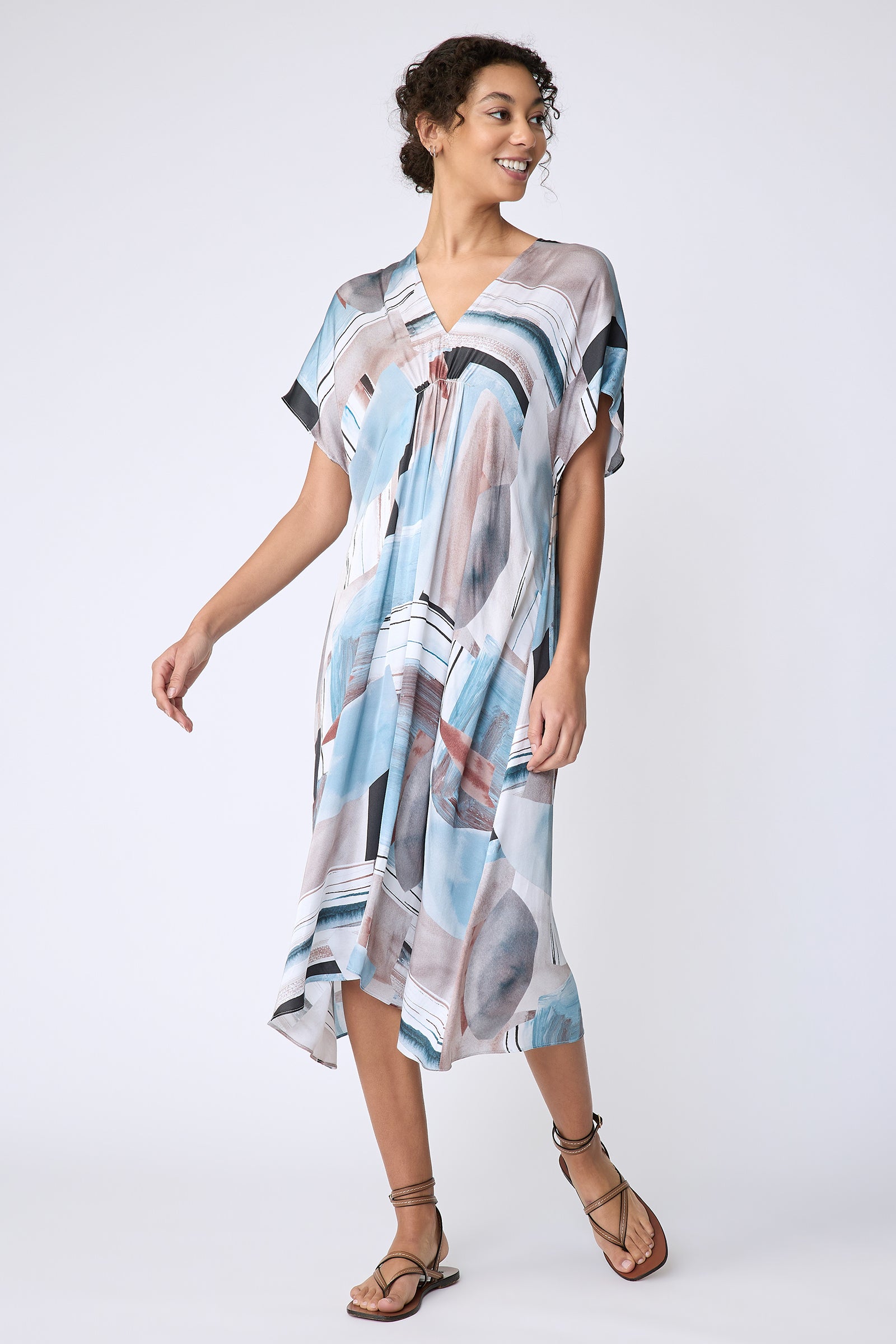 Kal Rieman Vanna Dress in Sante Fe Print blue on model front view looking to the side