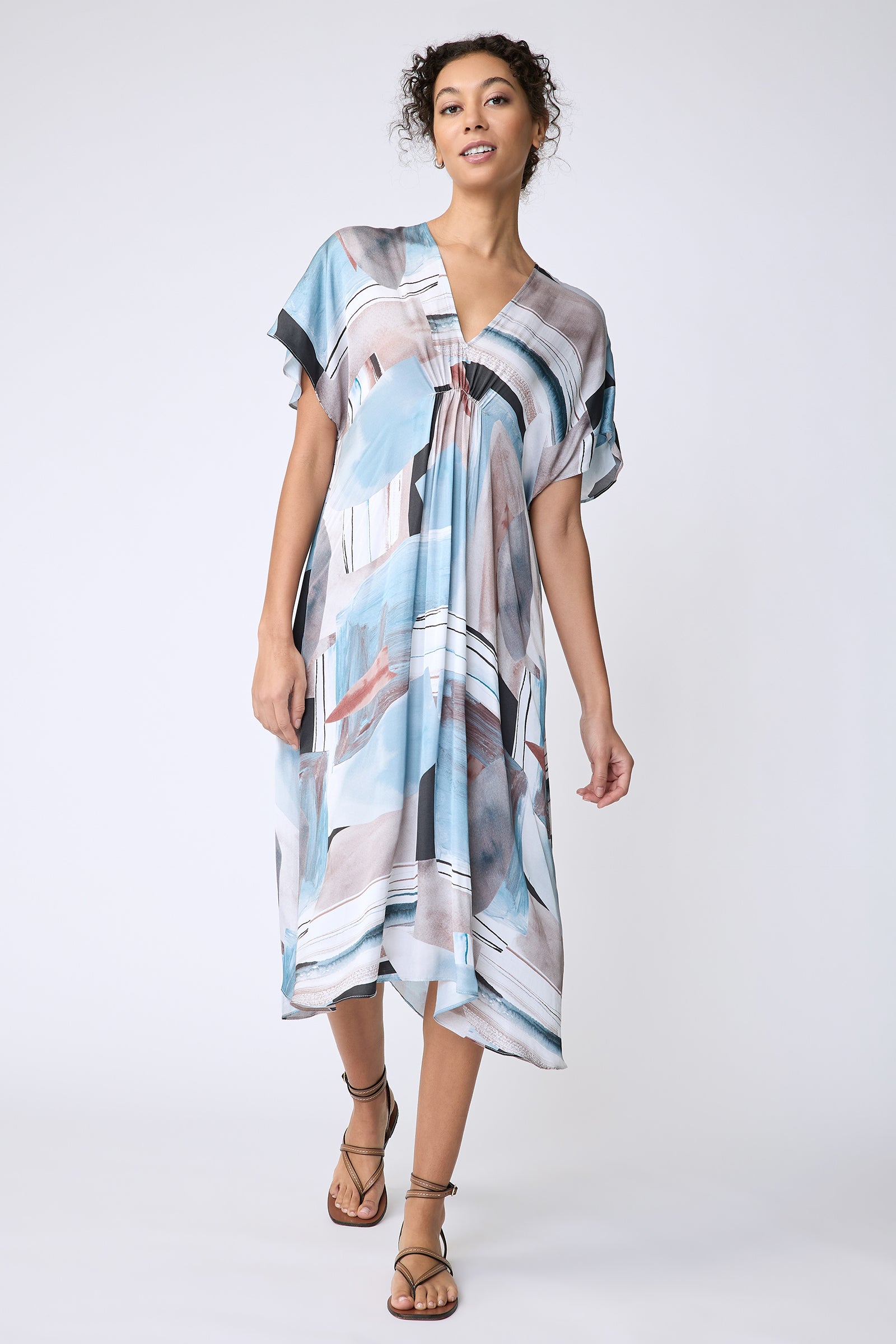 Kal Rieman Vanna Dress in Sante Fe Print blue on model front view walking