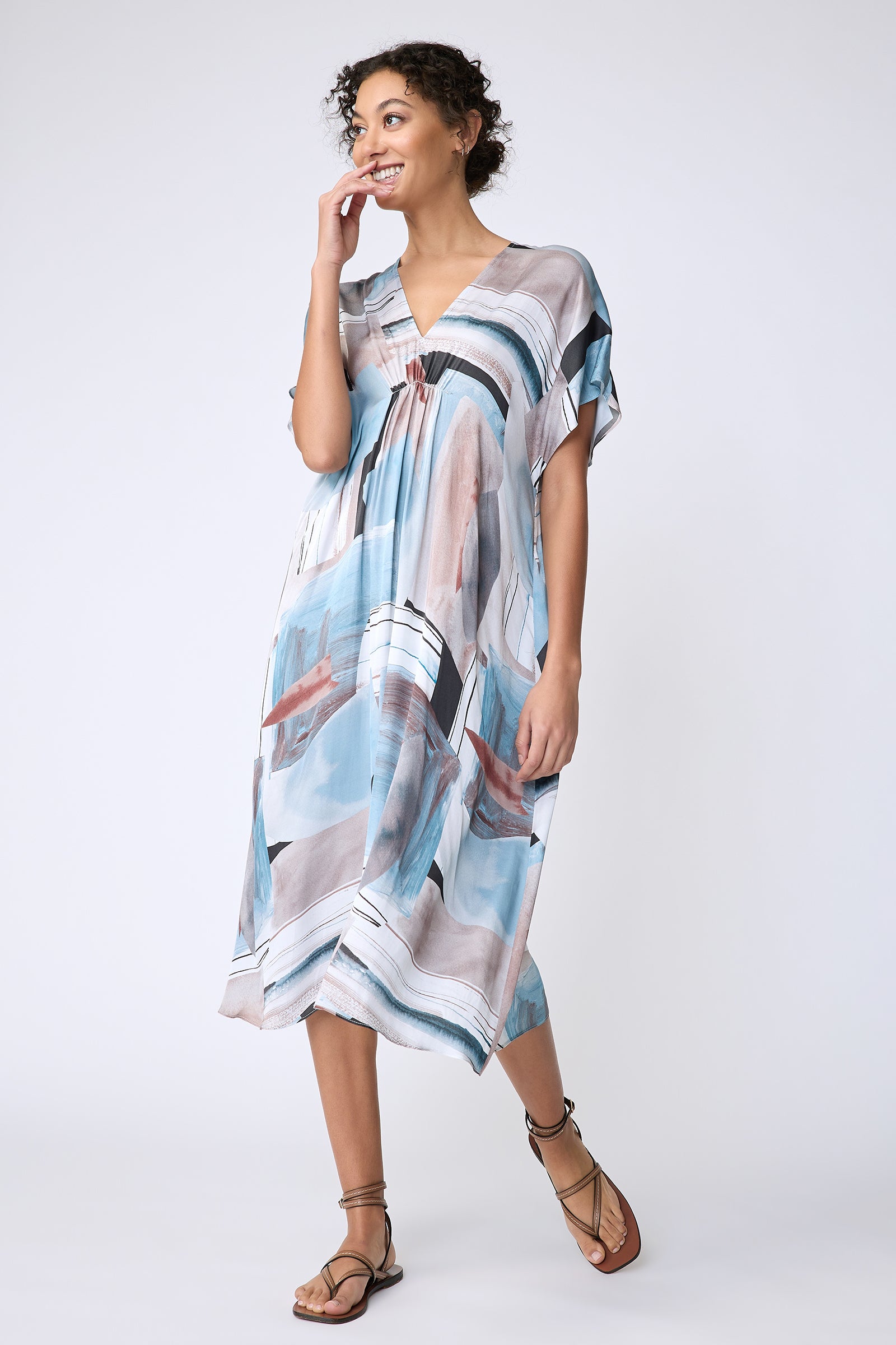 Kal Rieman Vanna Dress in Sante Fe Print blue on model side view walking