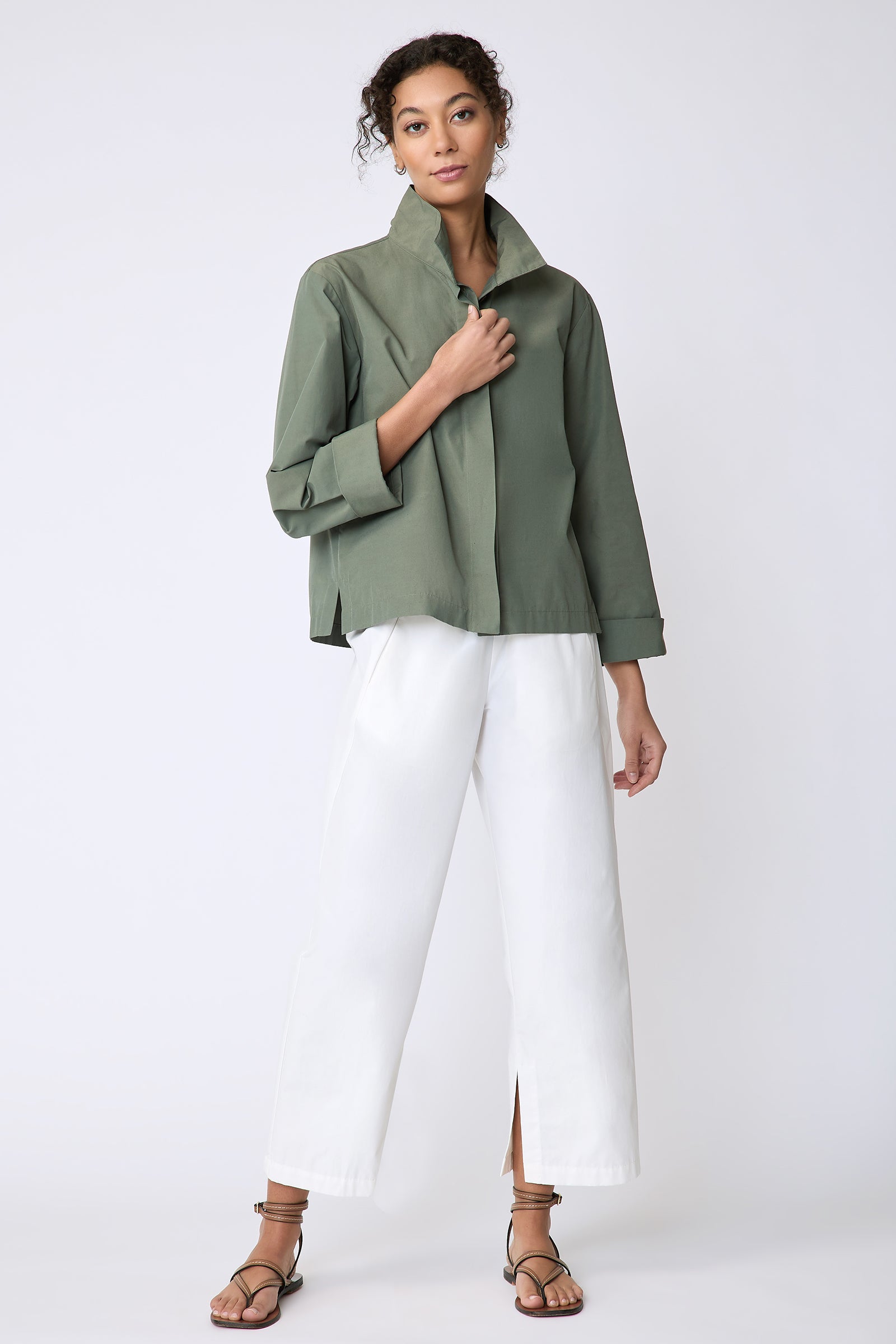 Peggy jacket in Italian Broadcloth in color cactus on model front view full look holding front of jacket