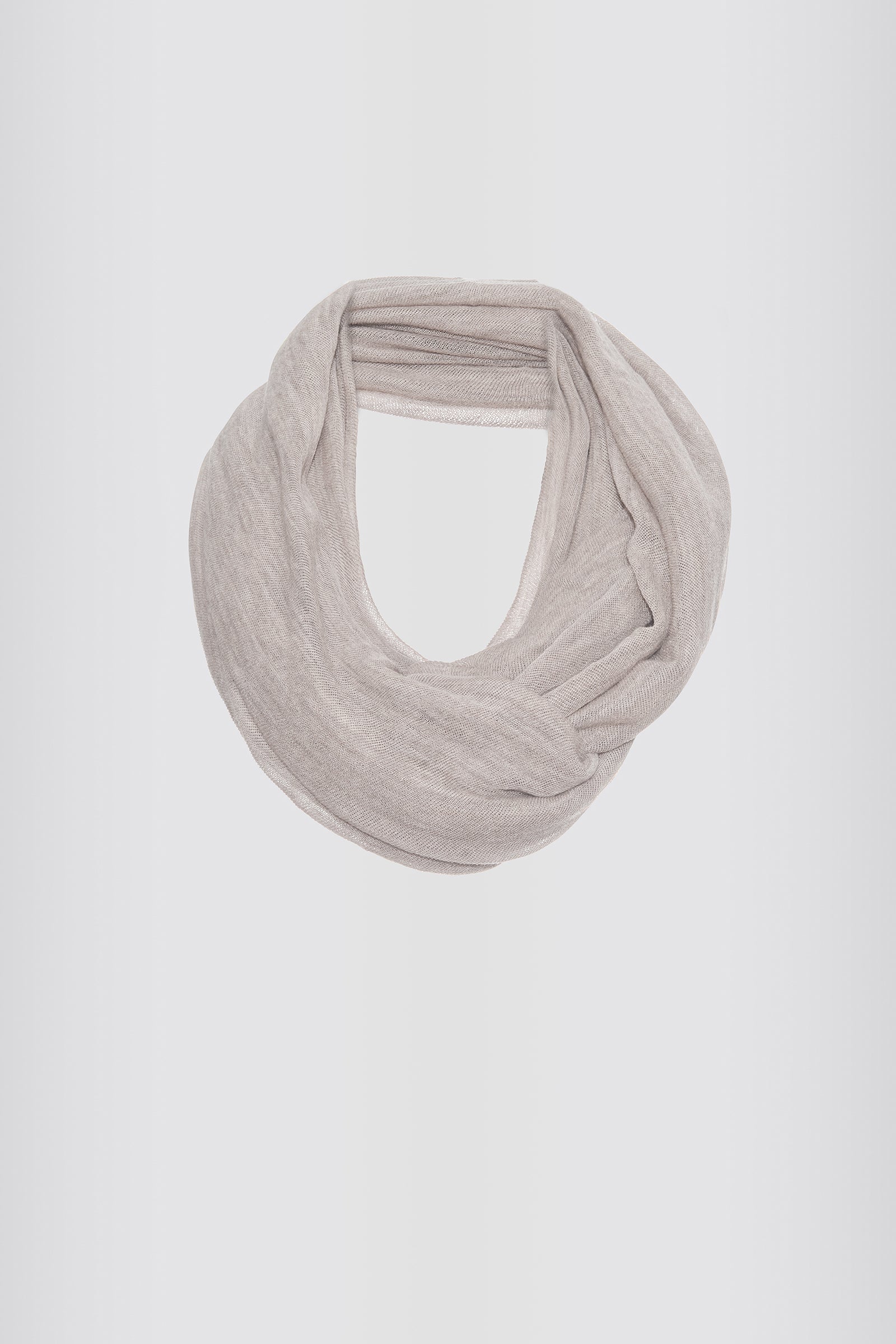Kal Rieman circle scarf in light beige on model front view