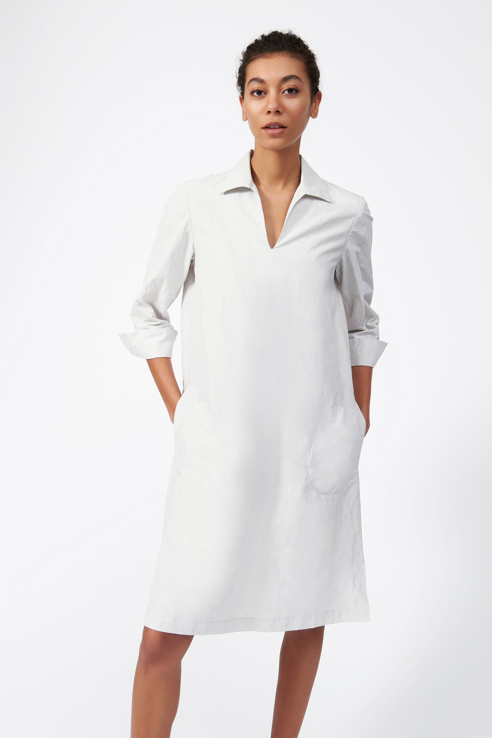 Kal Rieman Cecil Collared V-Neck Dress in Stone on model with hands in pockets front view