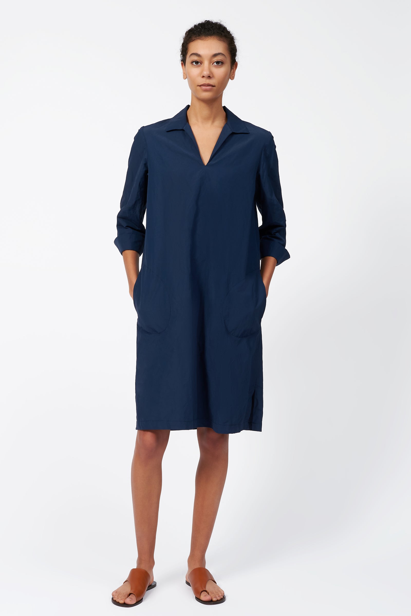 Kal Rieman Cecil Collared V-Neck Dress in Summer Navy on model with hands in pockets full front view