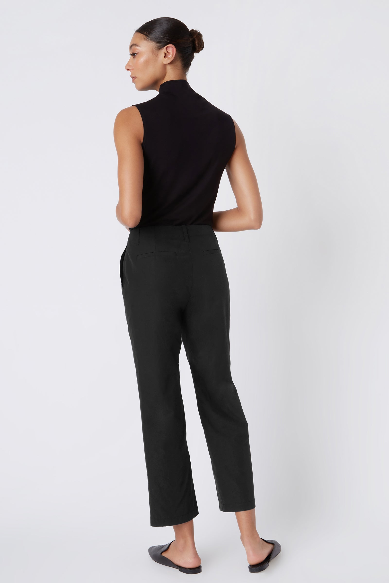 Kal Rieman Francoise Cigarette Pant in Black on Model with Arms Crossed Full Front View
