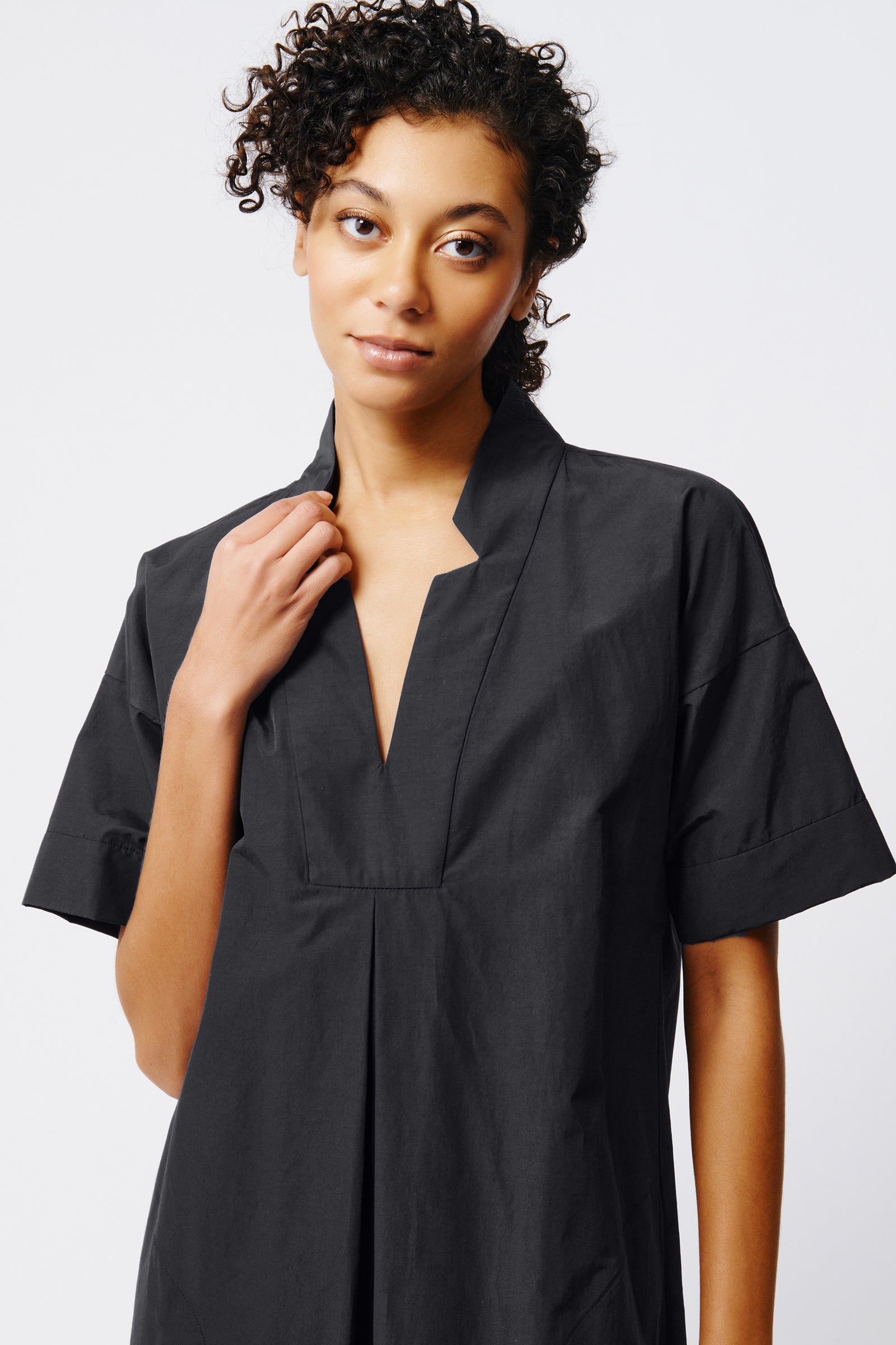 Kal Rieman Notch Placket Dress in Black on Model Front View Crop