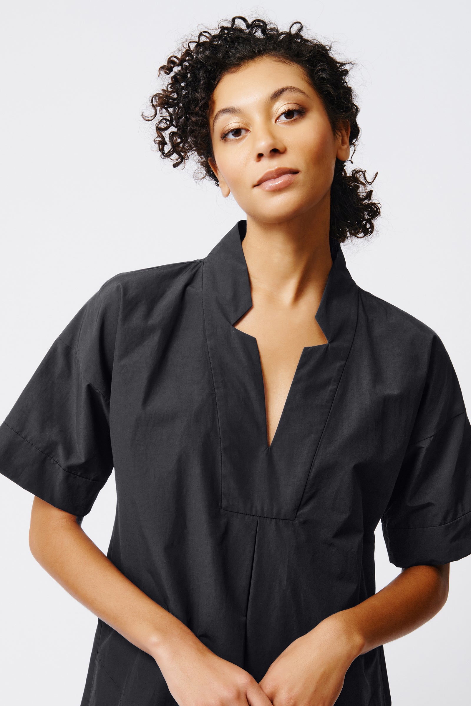 Kal Rieman Notch Placket Dress in Black on Model Front View Crop 2