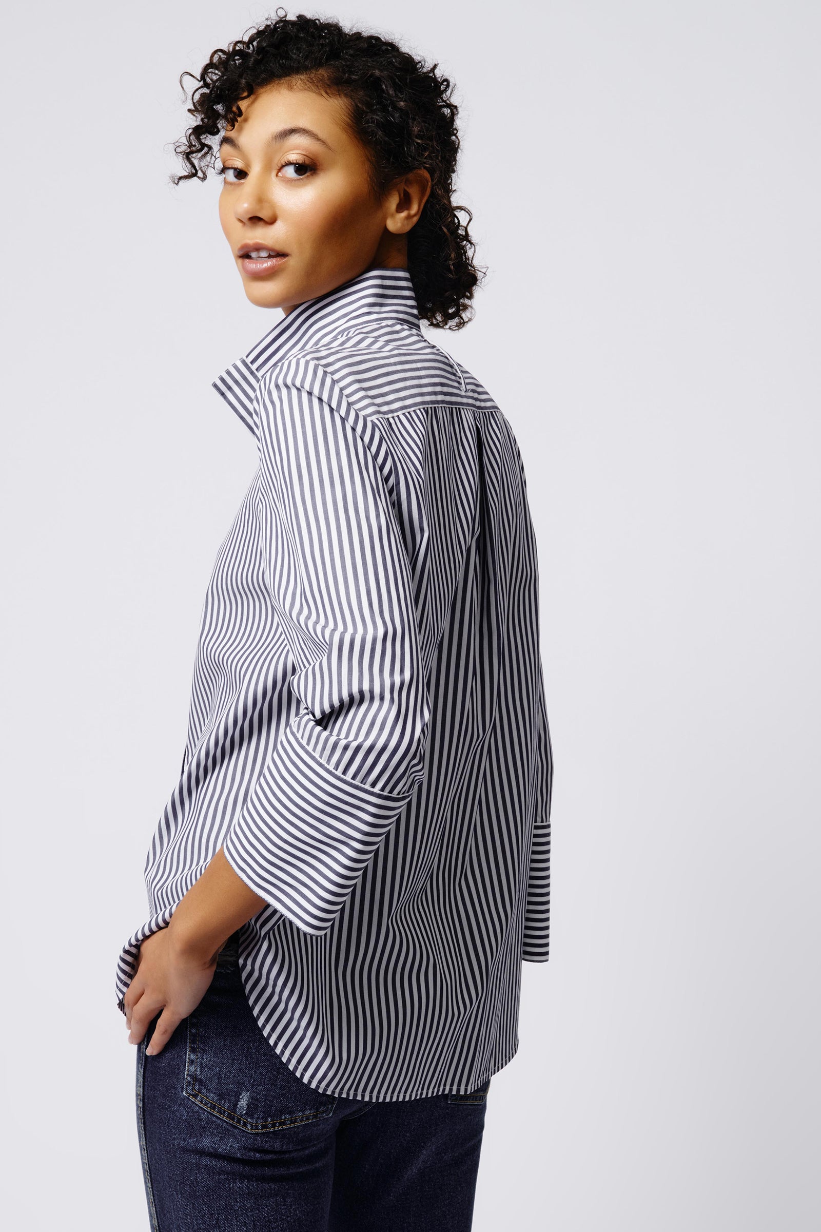 Kal Rieman Greta Placket Front Shirt in Indigo Stripe on Model Back View Crop